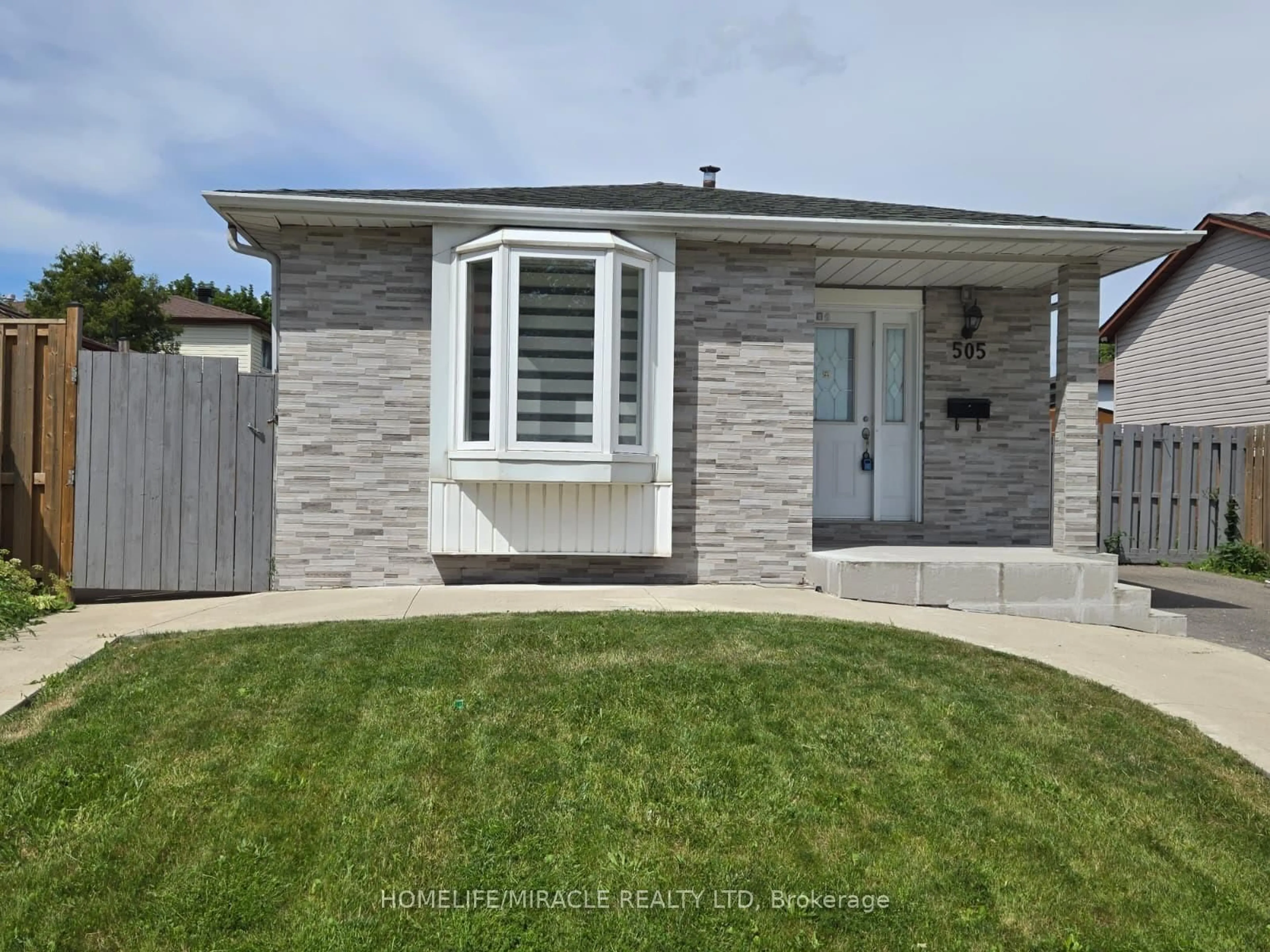 Home with vinyl exterior material, street for 505 Silverstone Dr, Toronto Ontario M9V 4G8