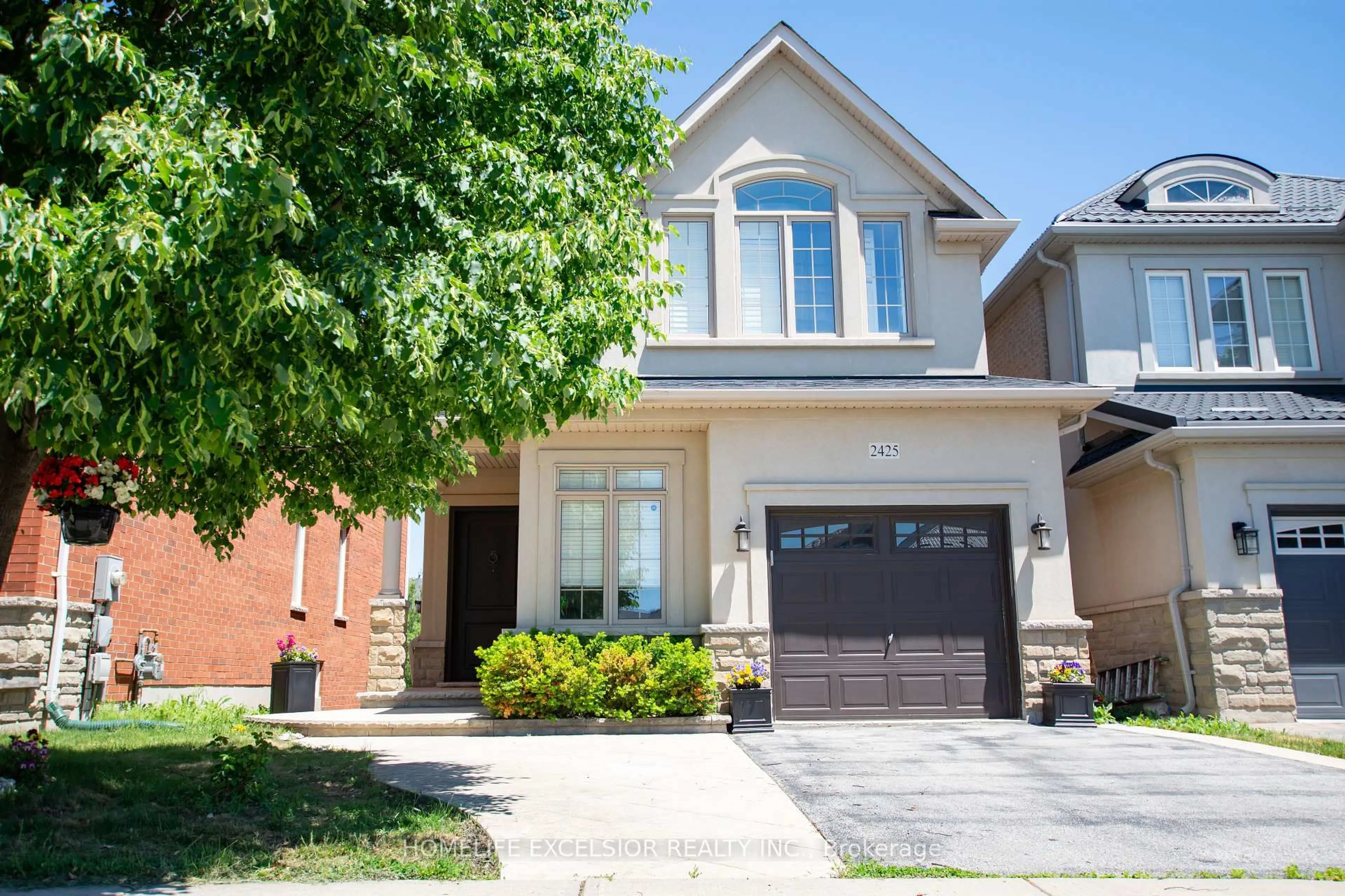 Home with brick exterior material, street for 2425 QUETICO Cres, Oakville Ontario L6M 0R4