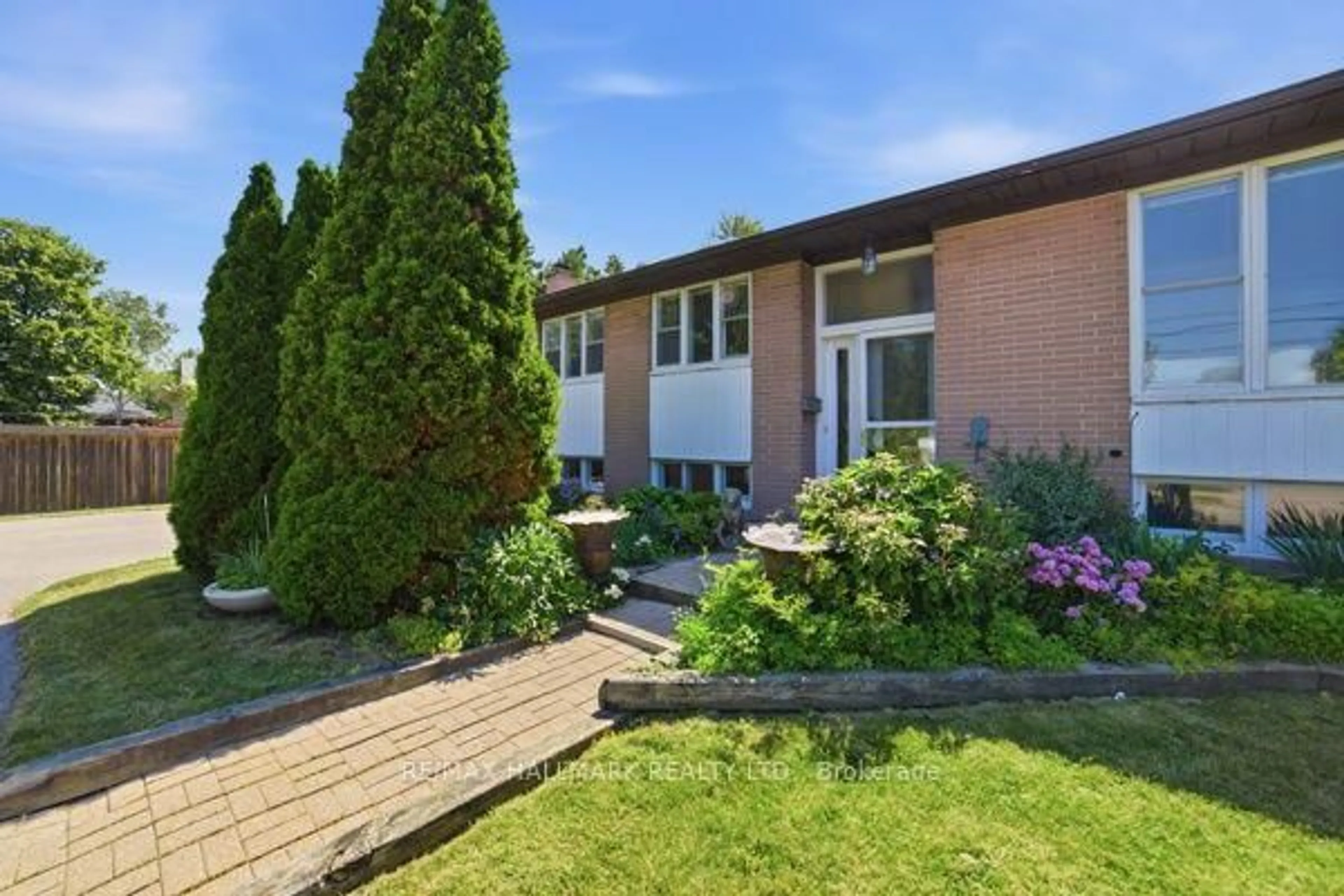 Home with brick exterior material, street for 1392 Rebecca St, Oakville Ontario L6L 1Z5