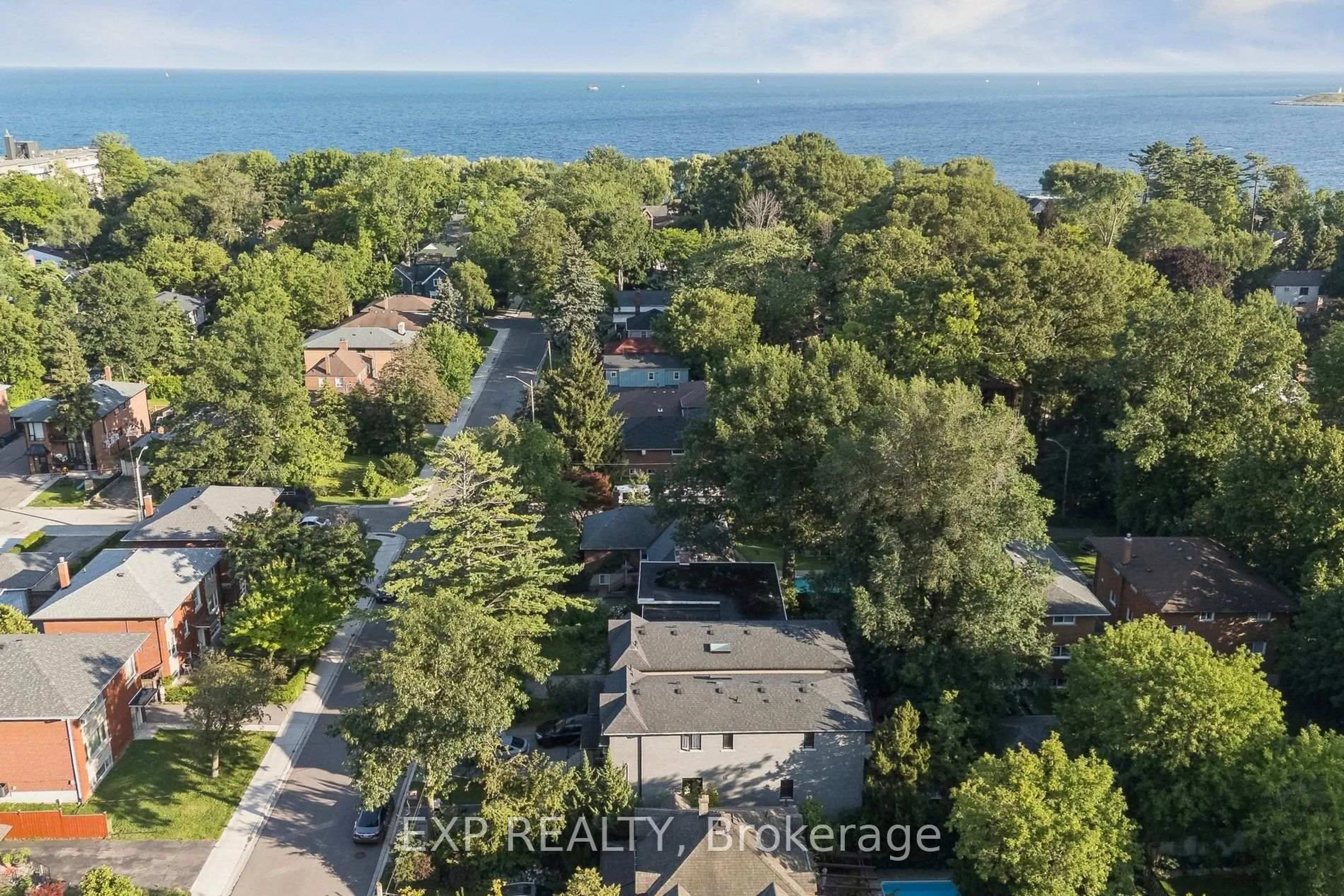 A pic from outside/outdoor area/front of a property/back of a property/a pic from drone, water/lake/river/ocean view for 44 Thirty Fifth St, Toronto Ontario M8W 3K2