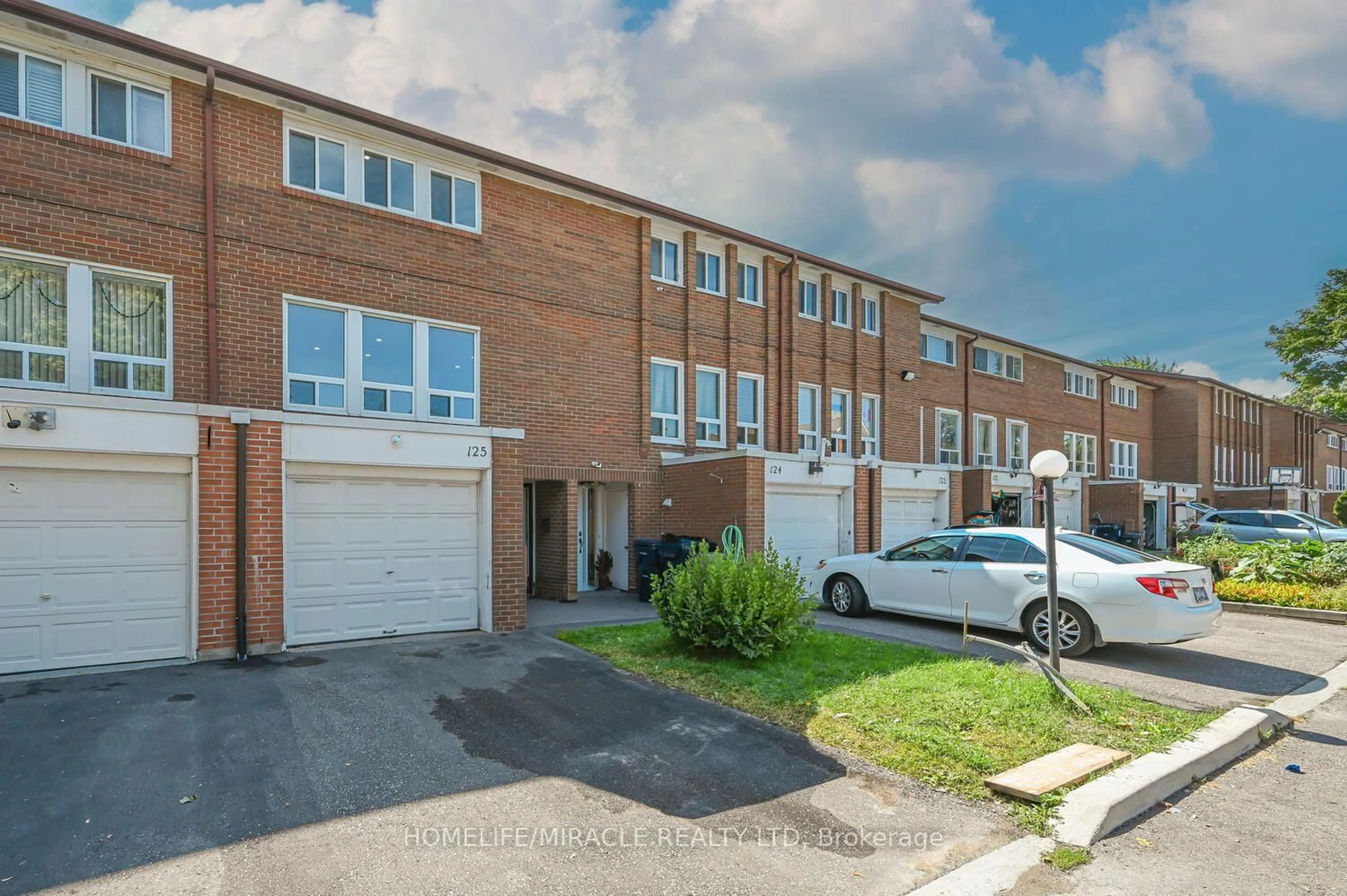 A pic from outside/outdoor area/front of a property/back of a property/a pic from drone, street for 6466 Finch Ave #125, Toronto Ontario M9V 1T4