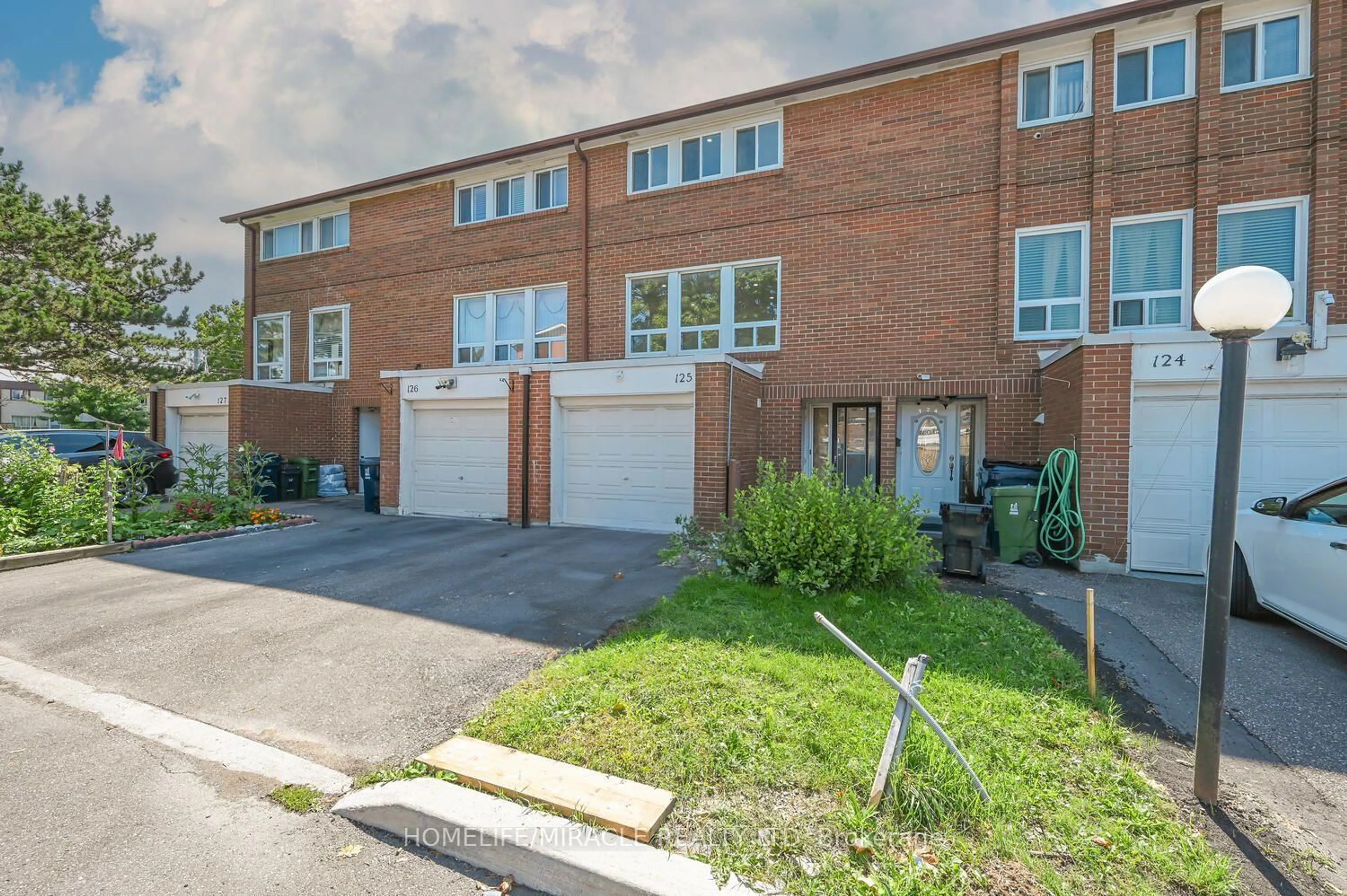 A pic from outside/outdoor area/front of a property/back of a property/a pic from drone, street for 6466 Finch Ave #125, Toronto Ontario M9V 1T4