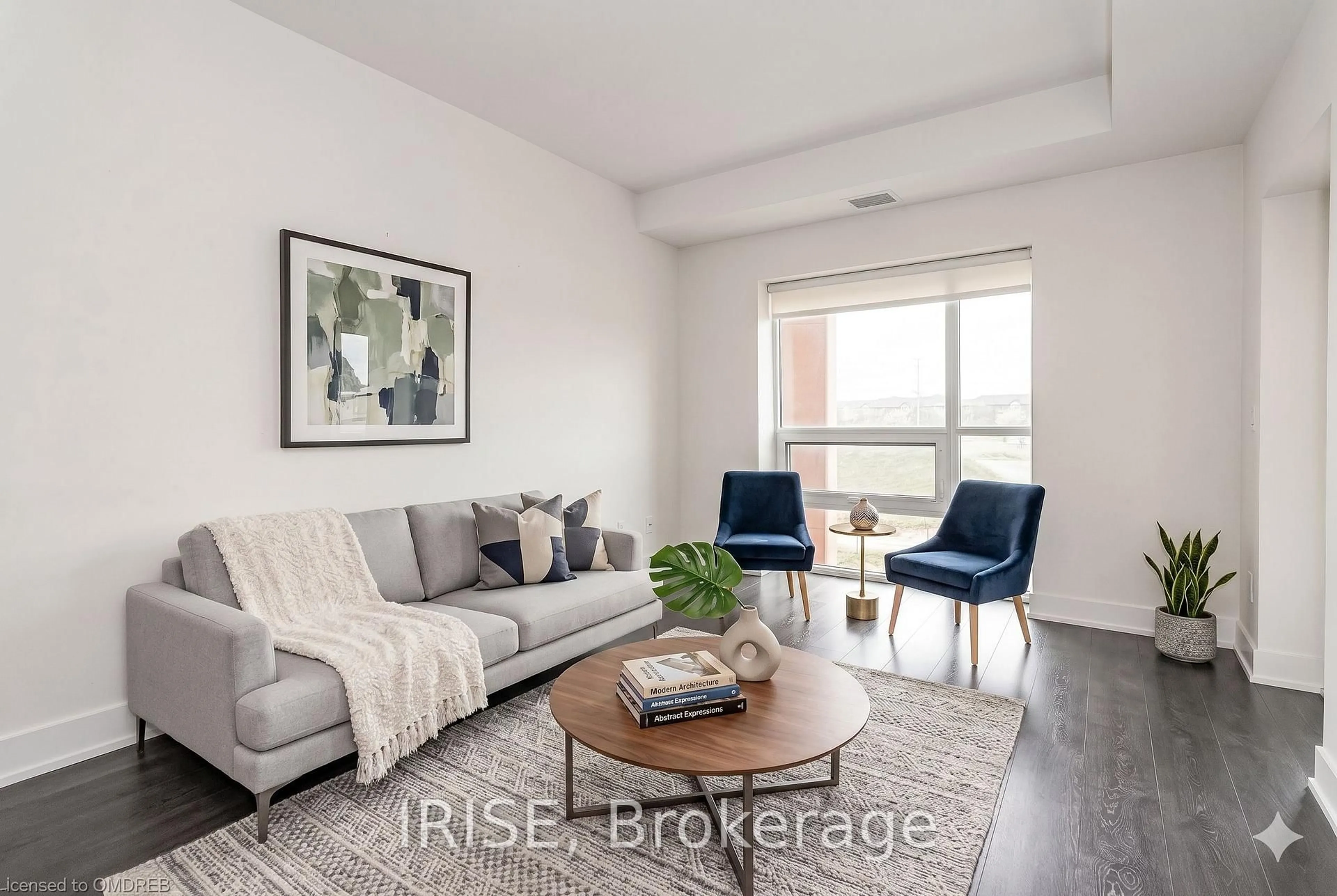 Living room with furniture, wood/laminate floor for 4040 Upper Middle Rd #319, Burlington Ontario L7M 0H2