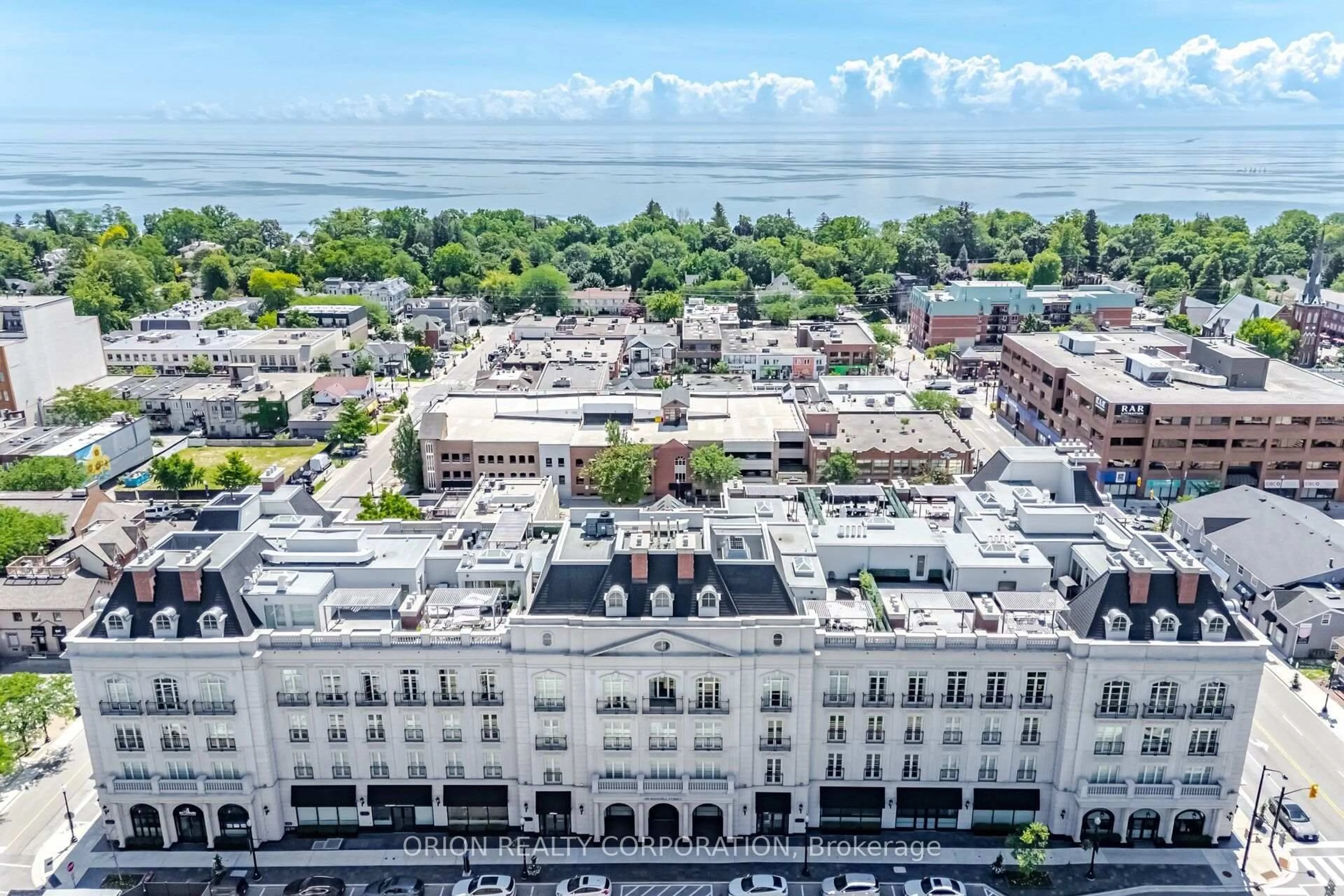 A pic from outside/outdoor area/front of a property/back of a property/a pic from drone, city buildings view from balcony for 300 Randall St #304, Oakville Ontario L6J 0G2