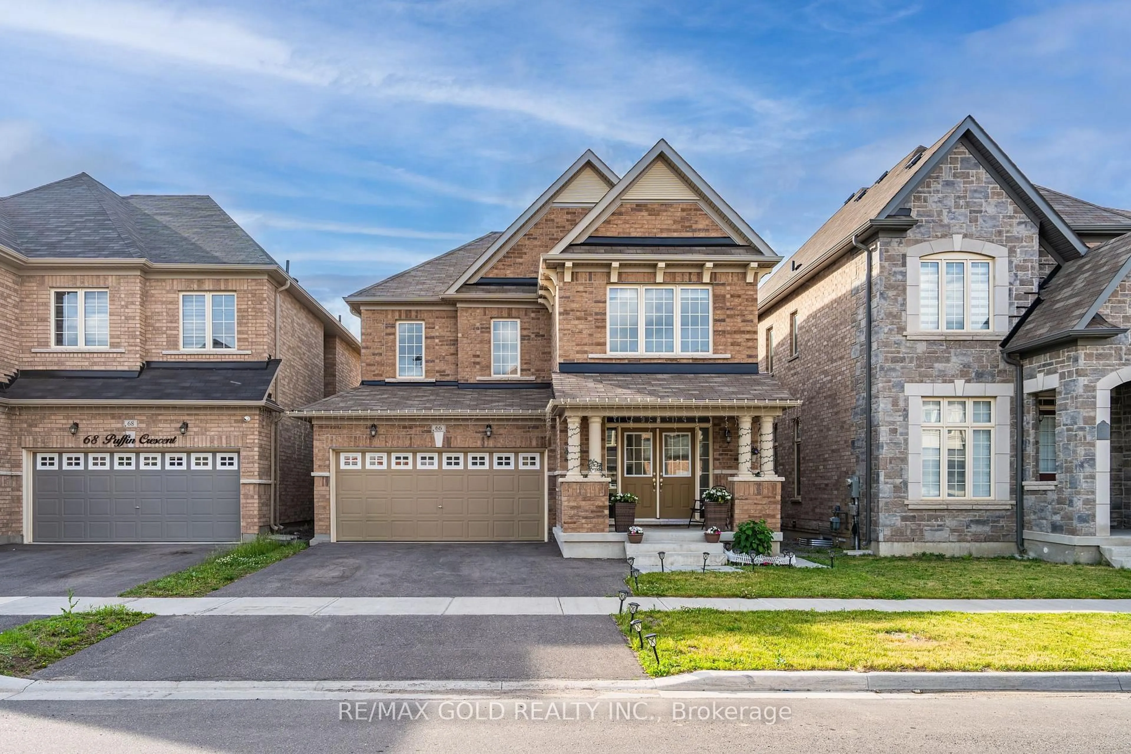 Home with brick exterior material, street for 66 Puffin Cres, Brampton Ontario L6R 4C3