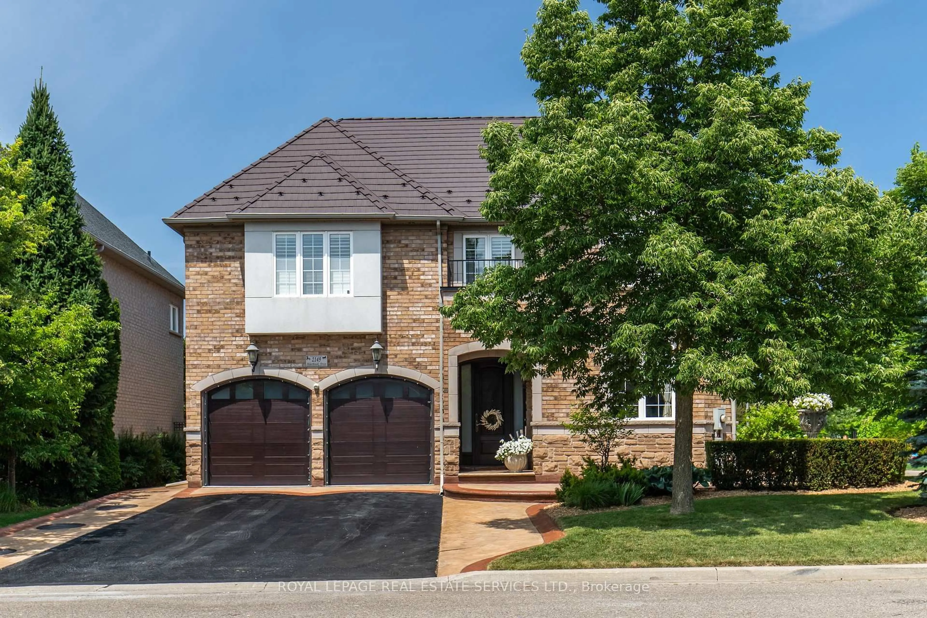 Home with brick exterior material, street for 2149 Alderbrook Dr, Oakville Ontario L6M 4Z3