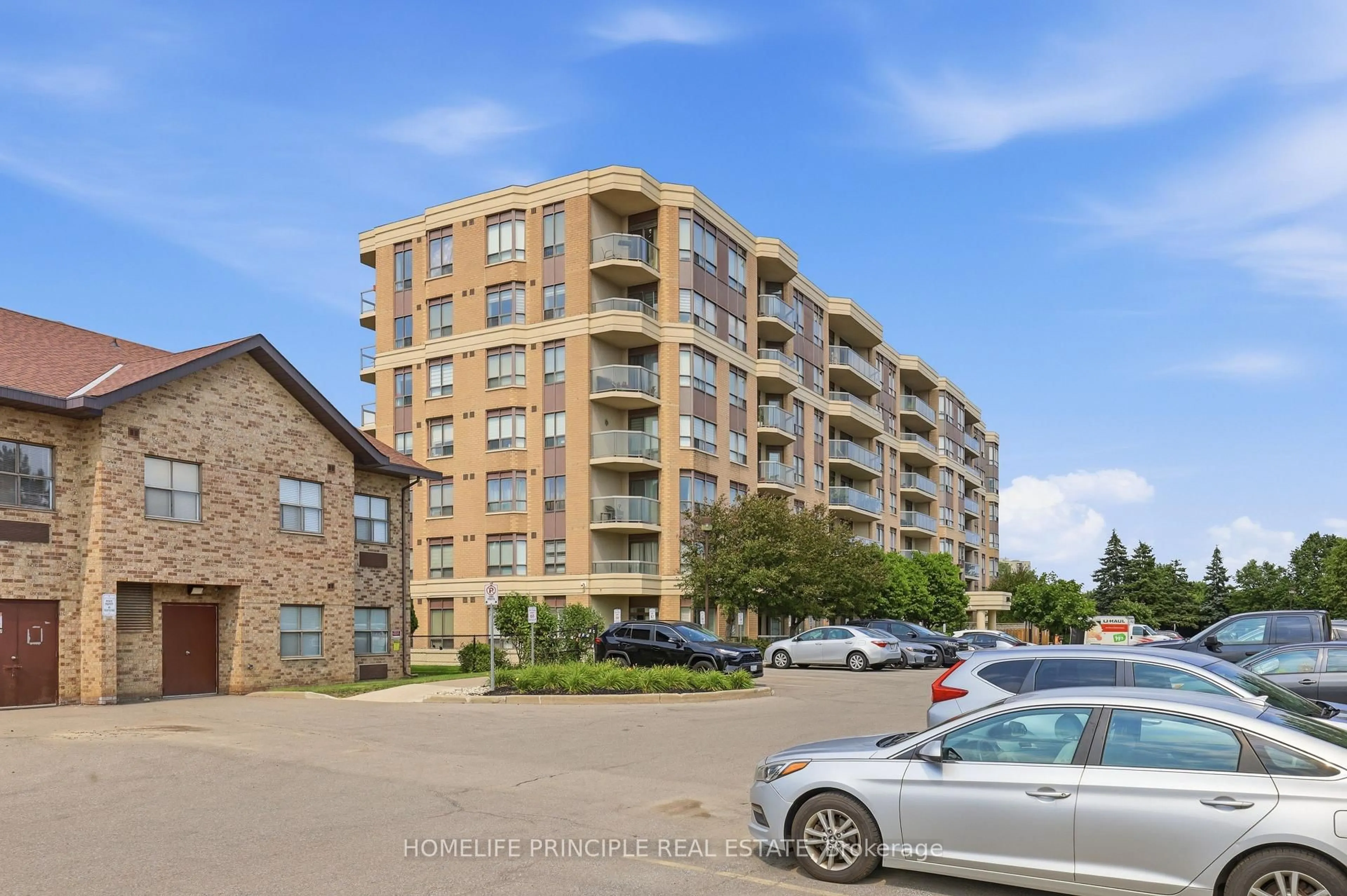 A pic from outside/outdoor area/front of a property/back of a property/a pic from drone, unknown for 300 Ray Lawson Blvd #201, Brampton Ontario L6Y 5H5