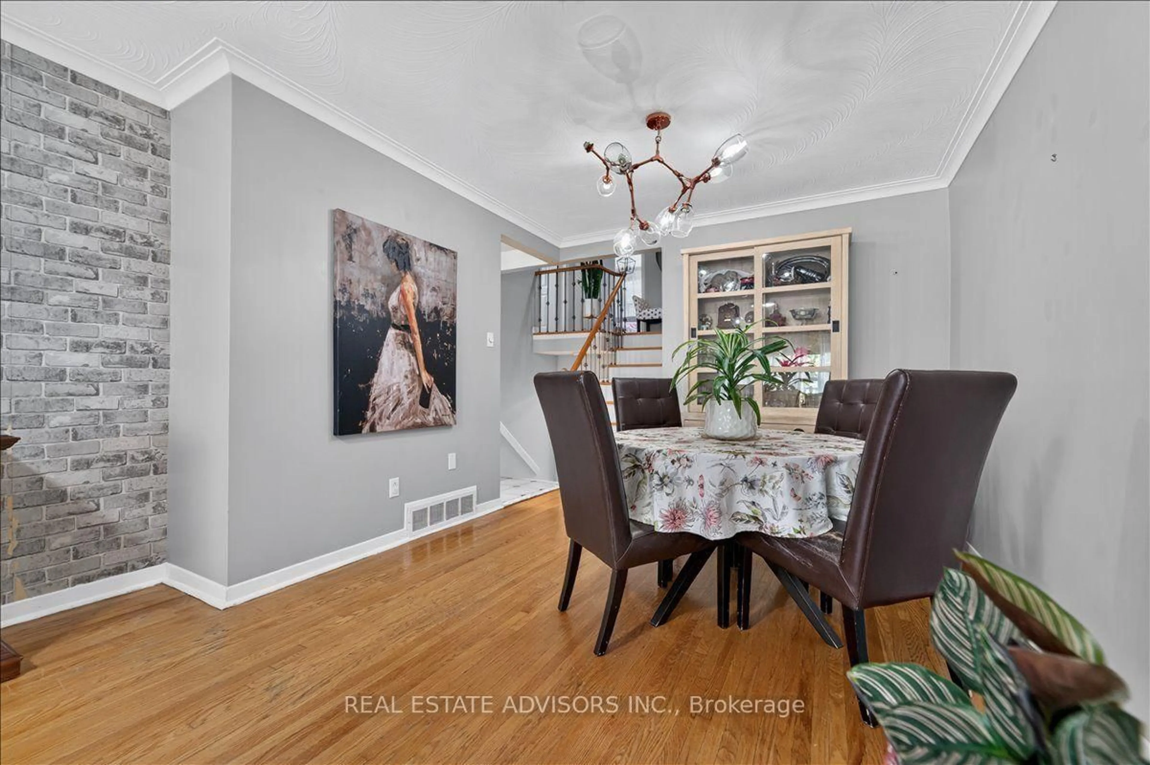 Dining room, wood/laminate floor for 14 Grampian Cres, Toronto Ontario M9L 2L3