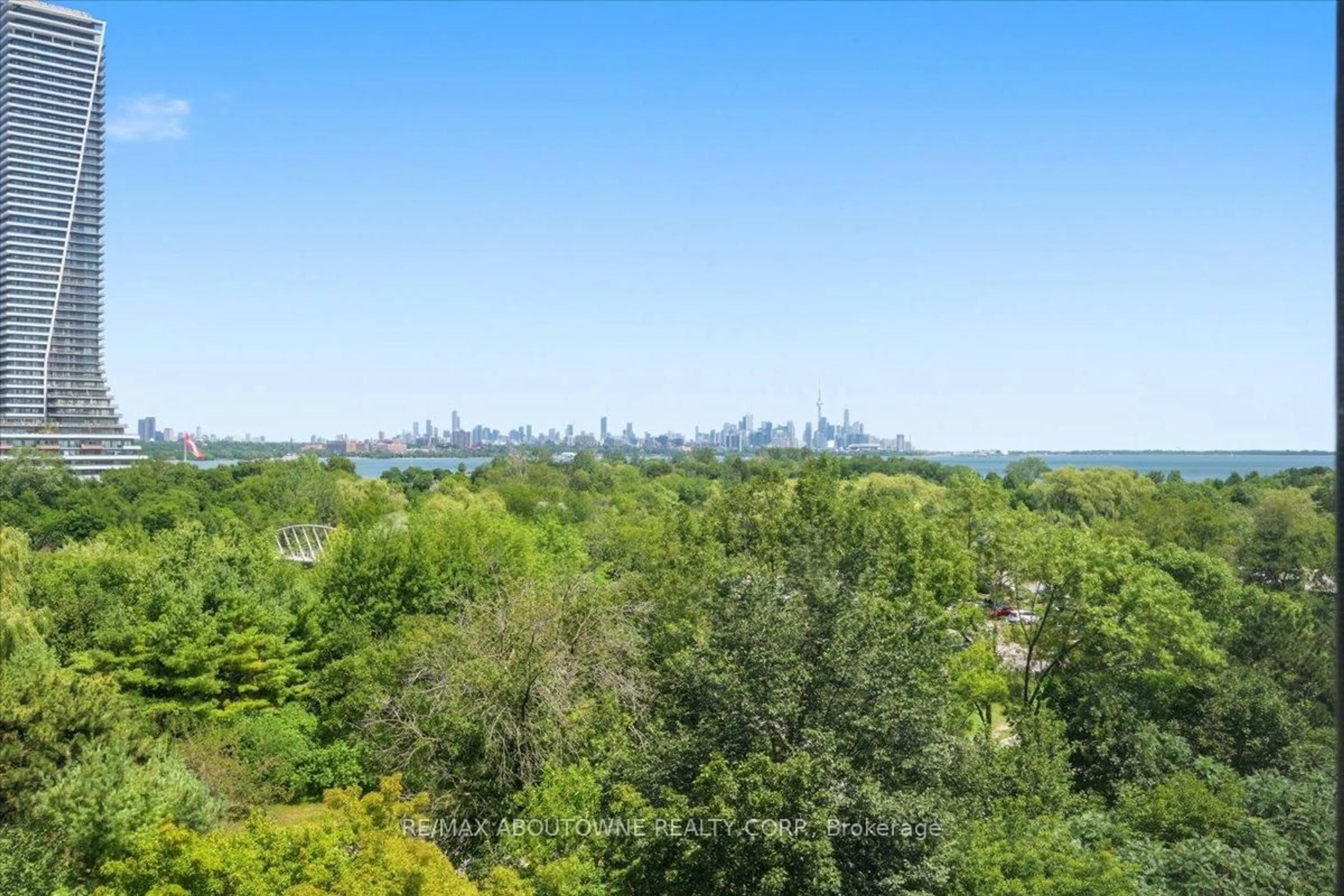 A pic from outside/outdoor area/front of a property/back of a property/a pic from drone, forest/trees view for 2261 Lakeshore Blvd #712, Toronto Ontario M8V 3X1