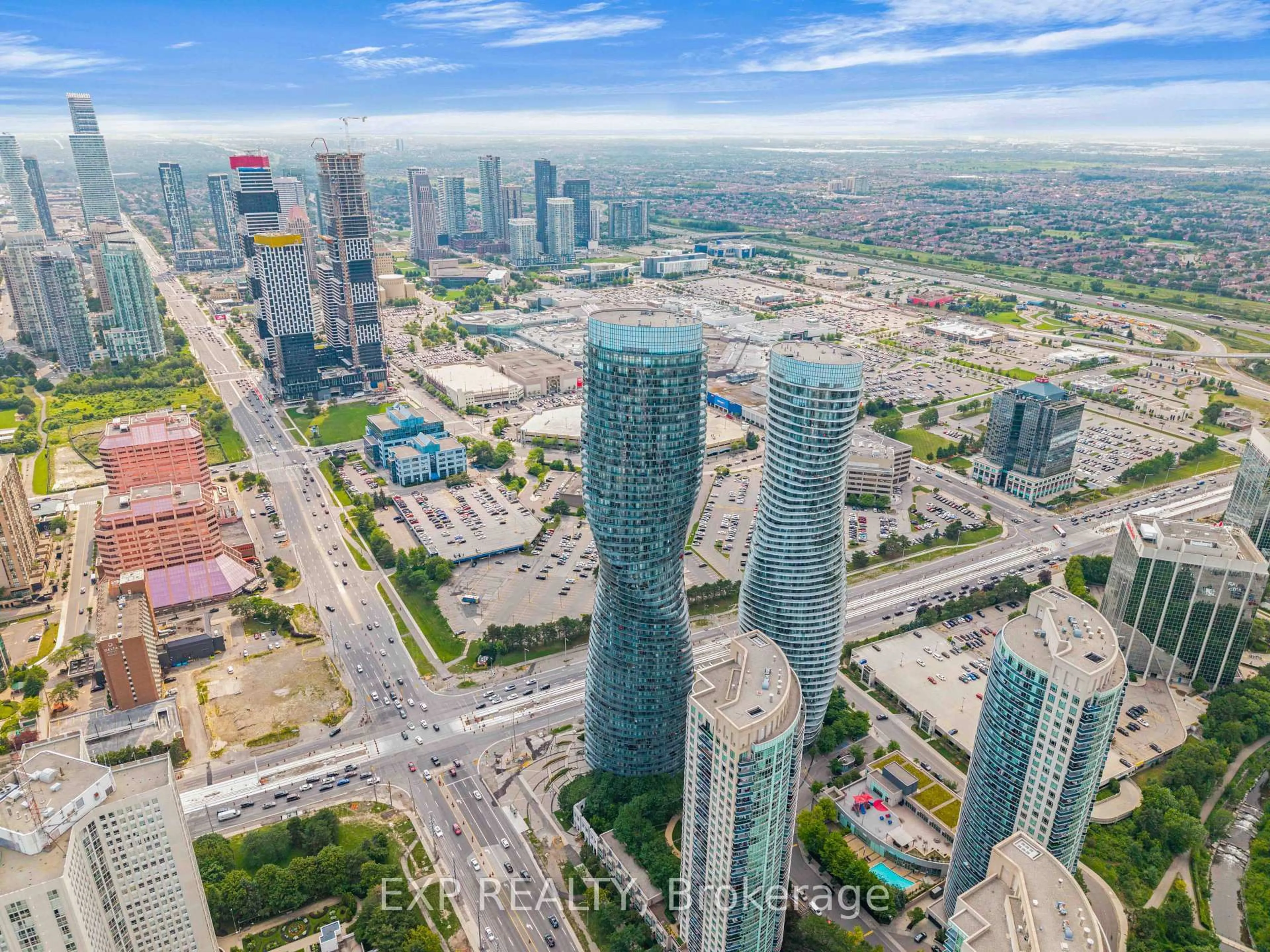 A pic from outside/outdoor area/front of a property/back of a property/a pic from drone, city buildings view from balcony for 60 Absolute Ave #1803, Mississauga Ontario L4Z 0A9