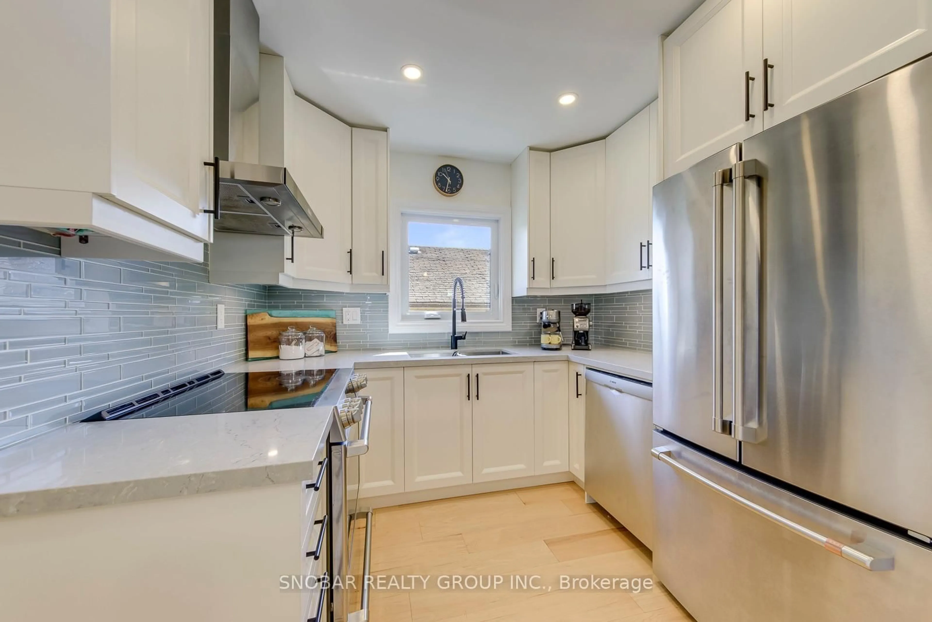 Open concept kitchen, ceramic/tile floor for 2257 Lawrence Ave, Toronto Ontario M9P 2A4