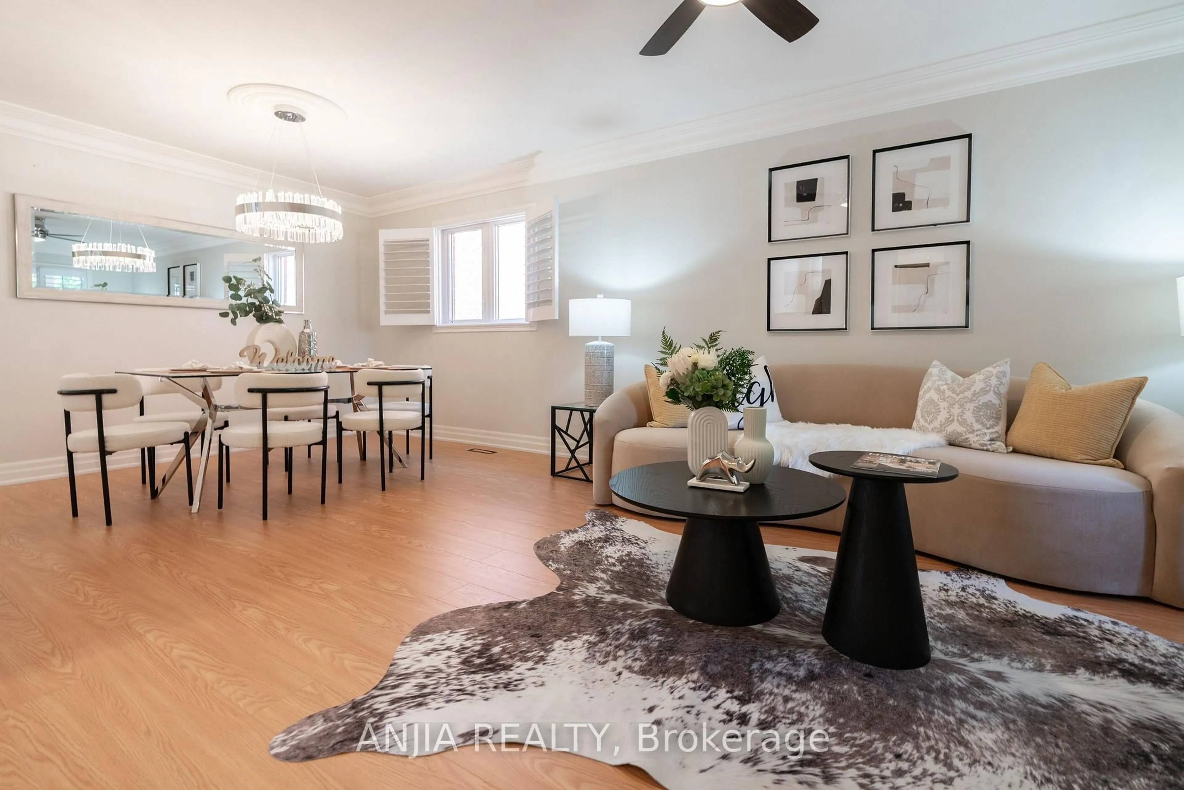 Living room with furniture, wood/laminate floor for 2410 Eden Valley Dr, Oakville Ontario L6H 6L2