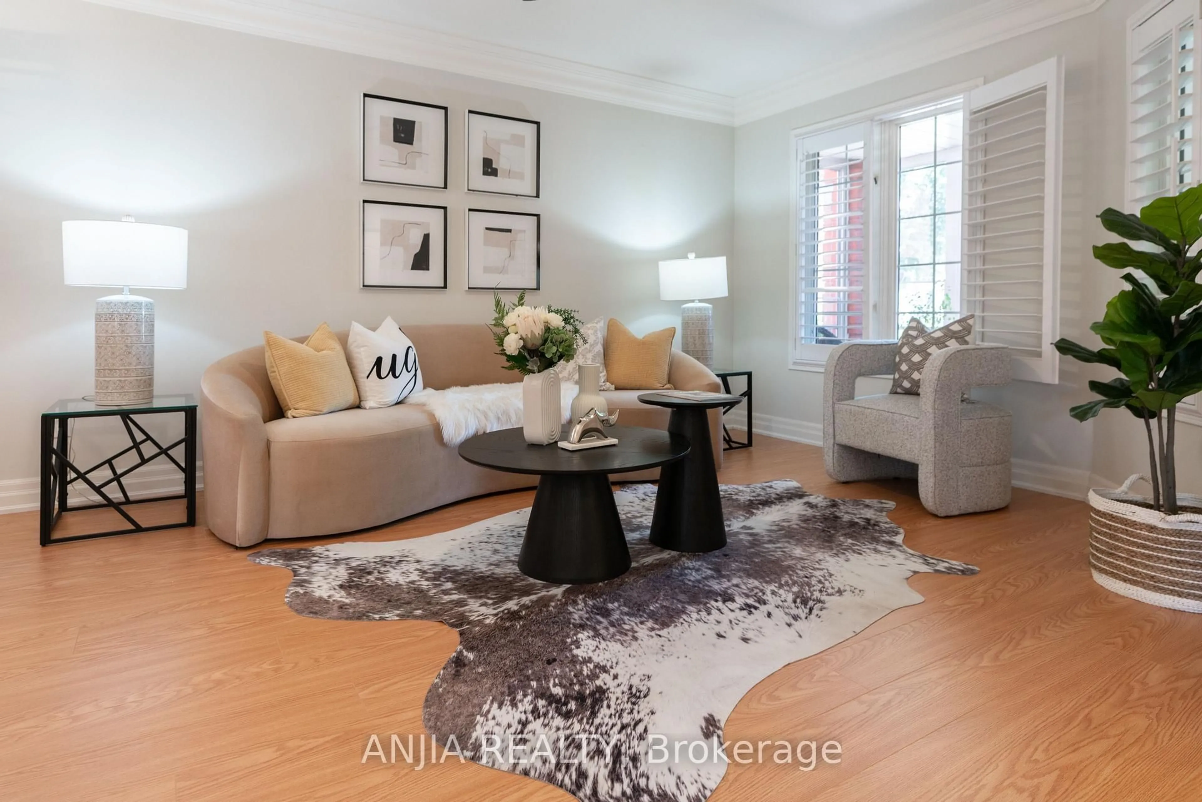 Living room with furniture, wood/laminate floor for 2410 Eden Valley Dr, Oakville Ontario L6H 6L2