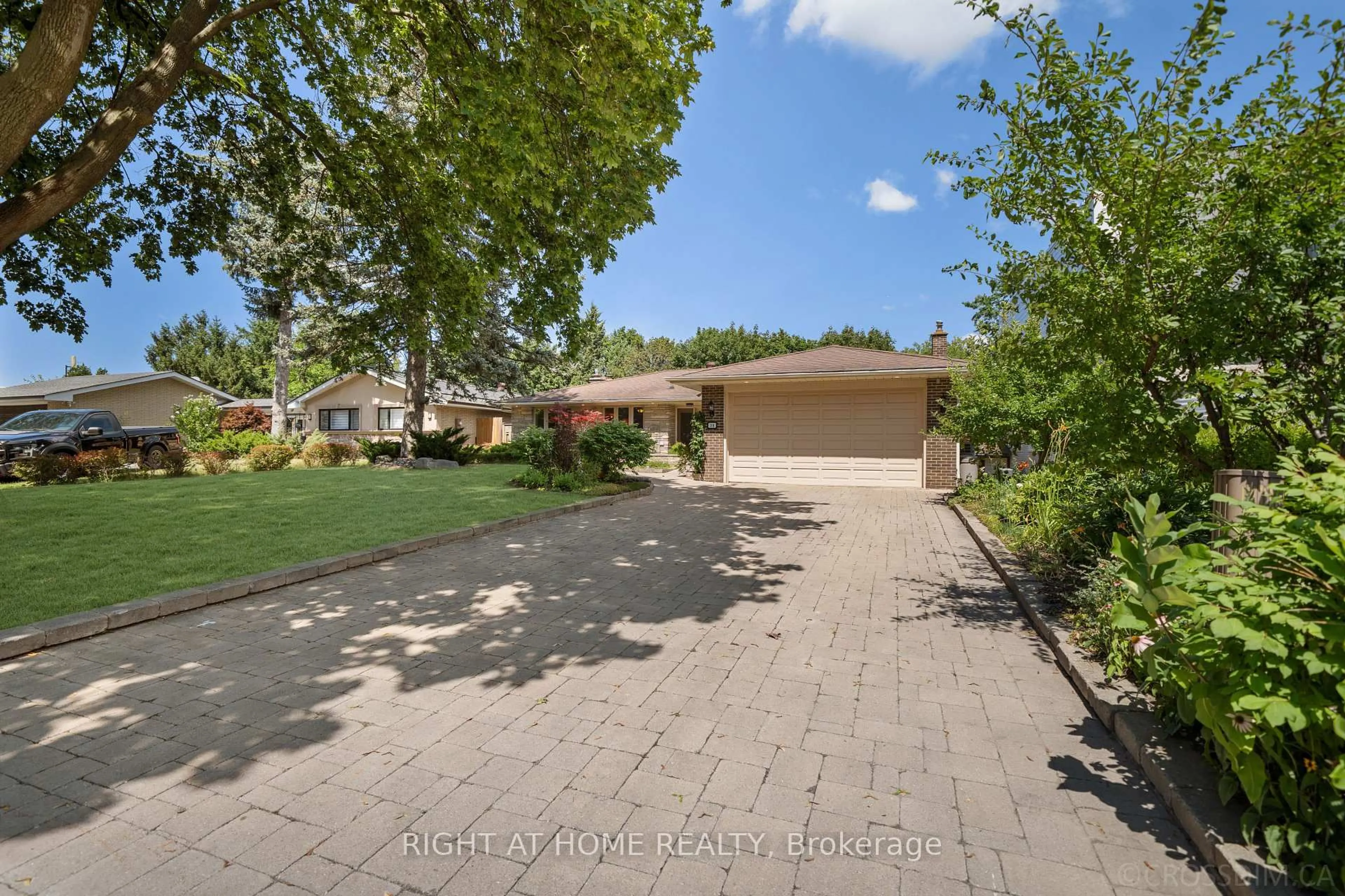 A pic from outside/outdoor area/front of a property/back of a property/a pic from drone, street for 39 Grovetree Rd, Toronto Ontario M9V 2Y4