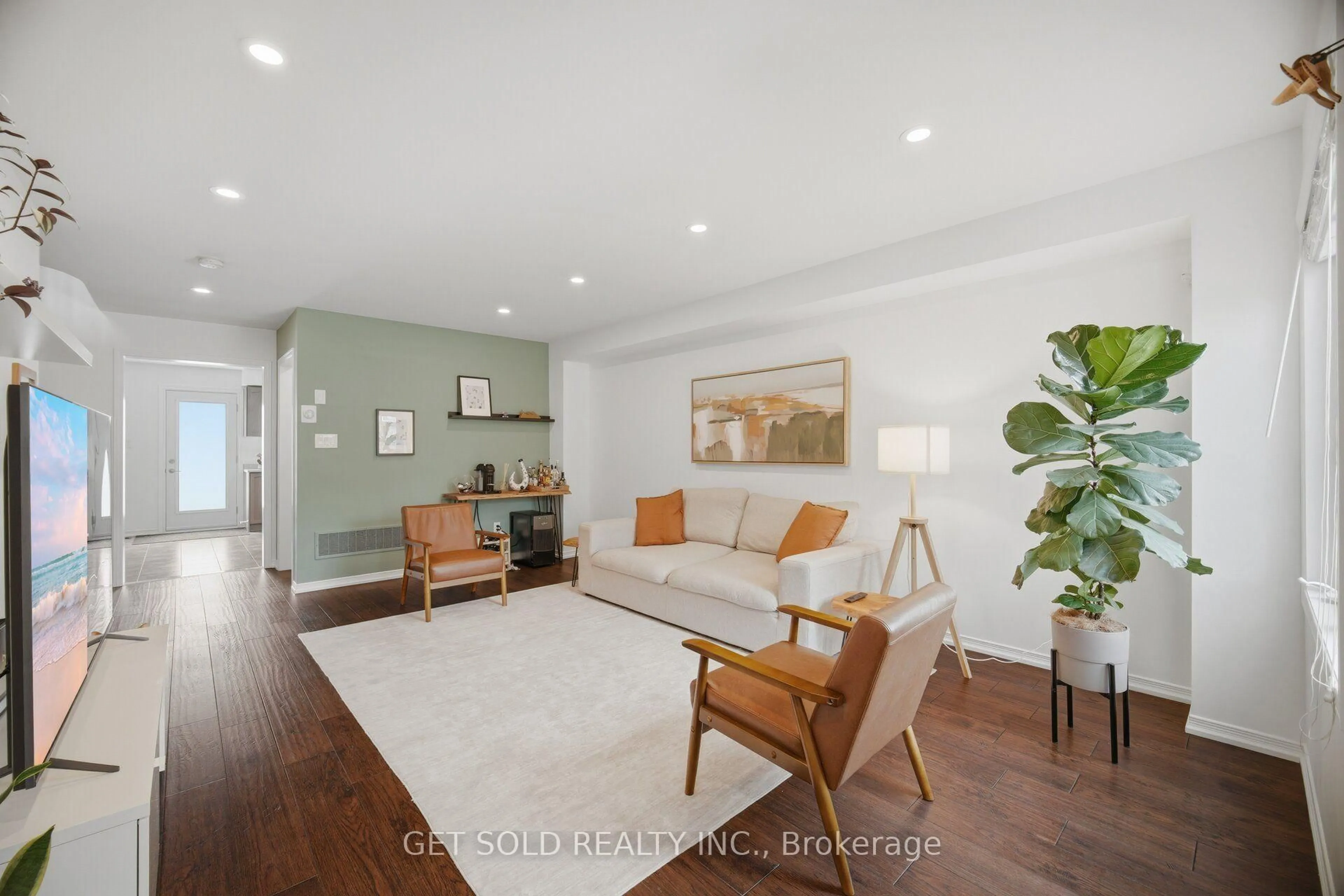 Living room with furniture, wood/laminate floor for 426 Geddes Landing, Milton Ontario L9T 7X3