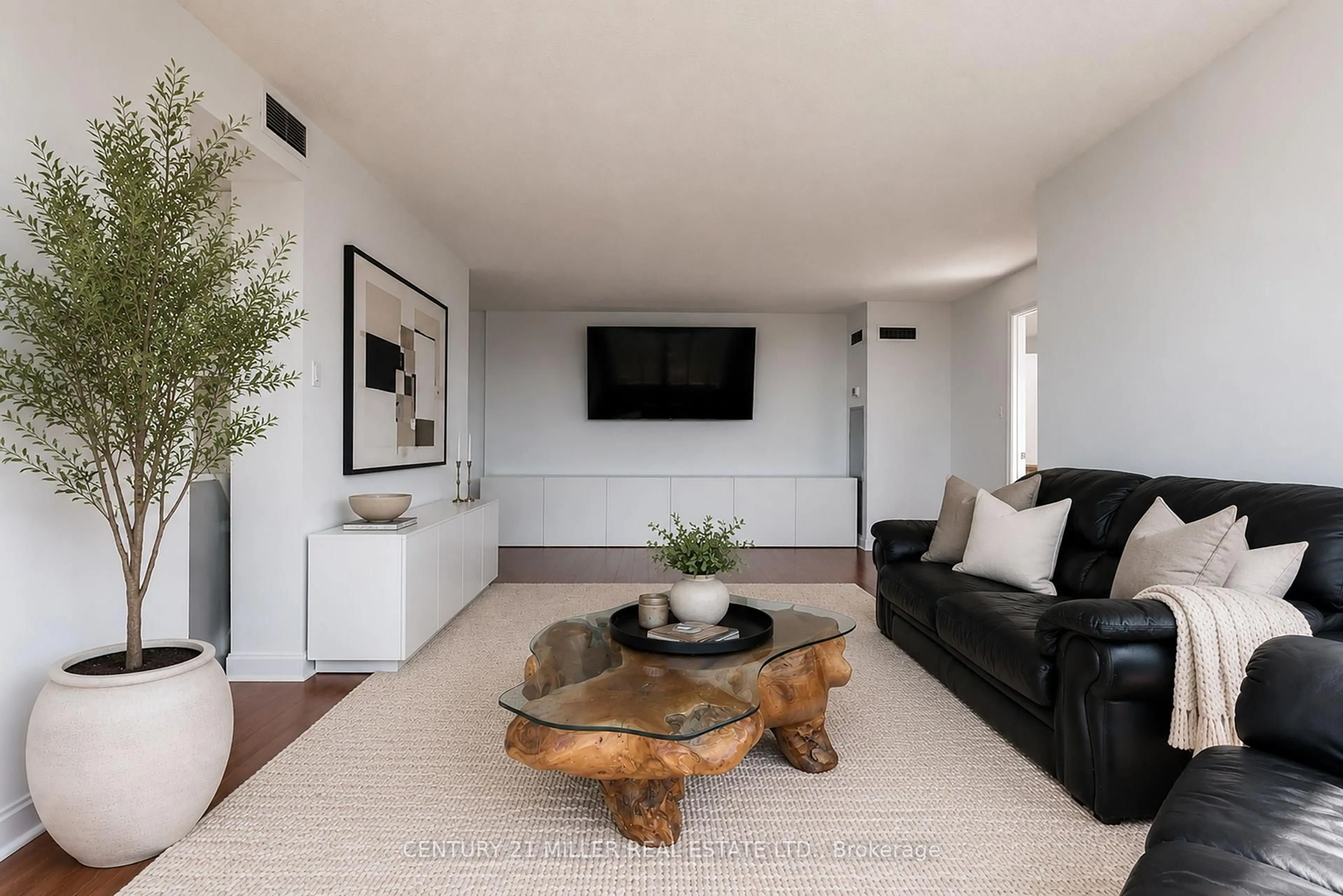 Living room with furniture, unknown for 55 Kingsbridge Garden Circ #909, Mississauga Ontario L5R 1Y1