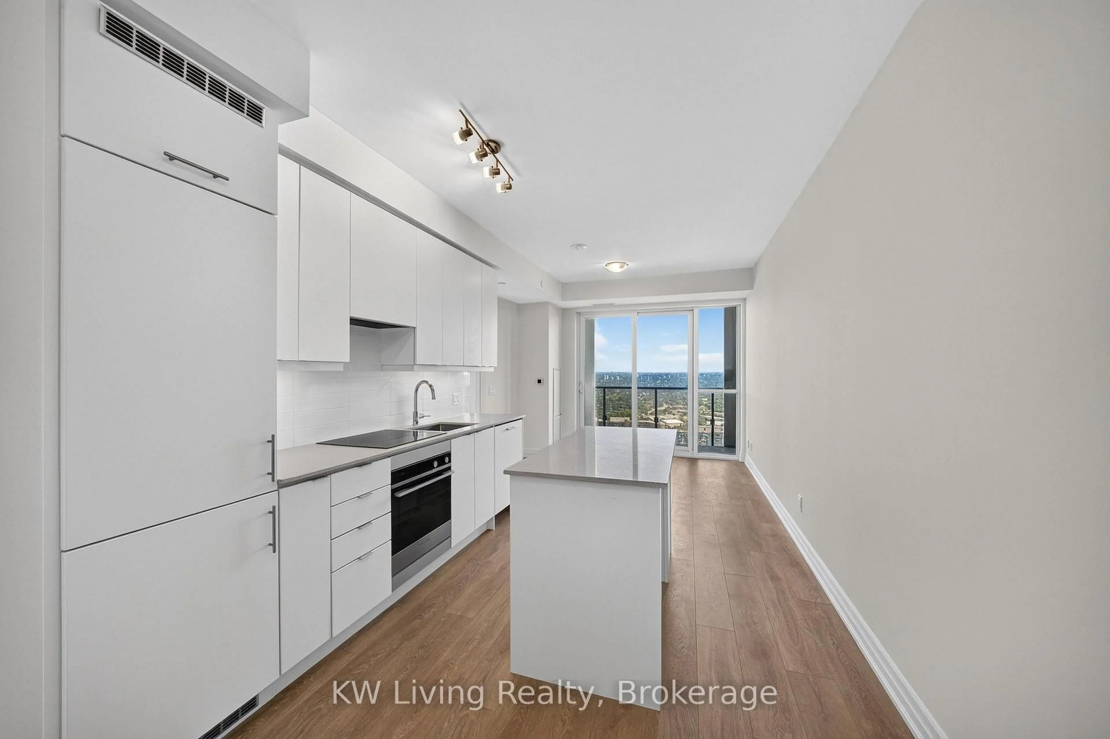Open concept kitchen, wood/laminate floor for 30 Elm Dr #3502, Mississauga Ontario L5B 0N6