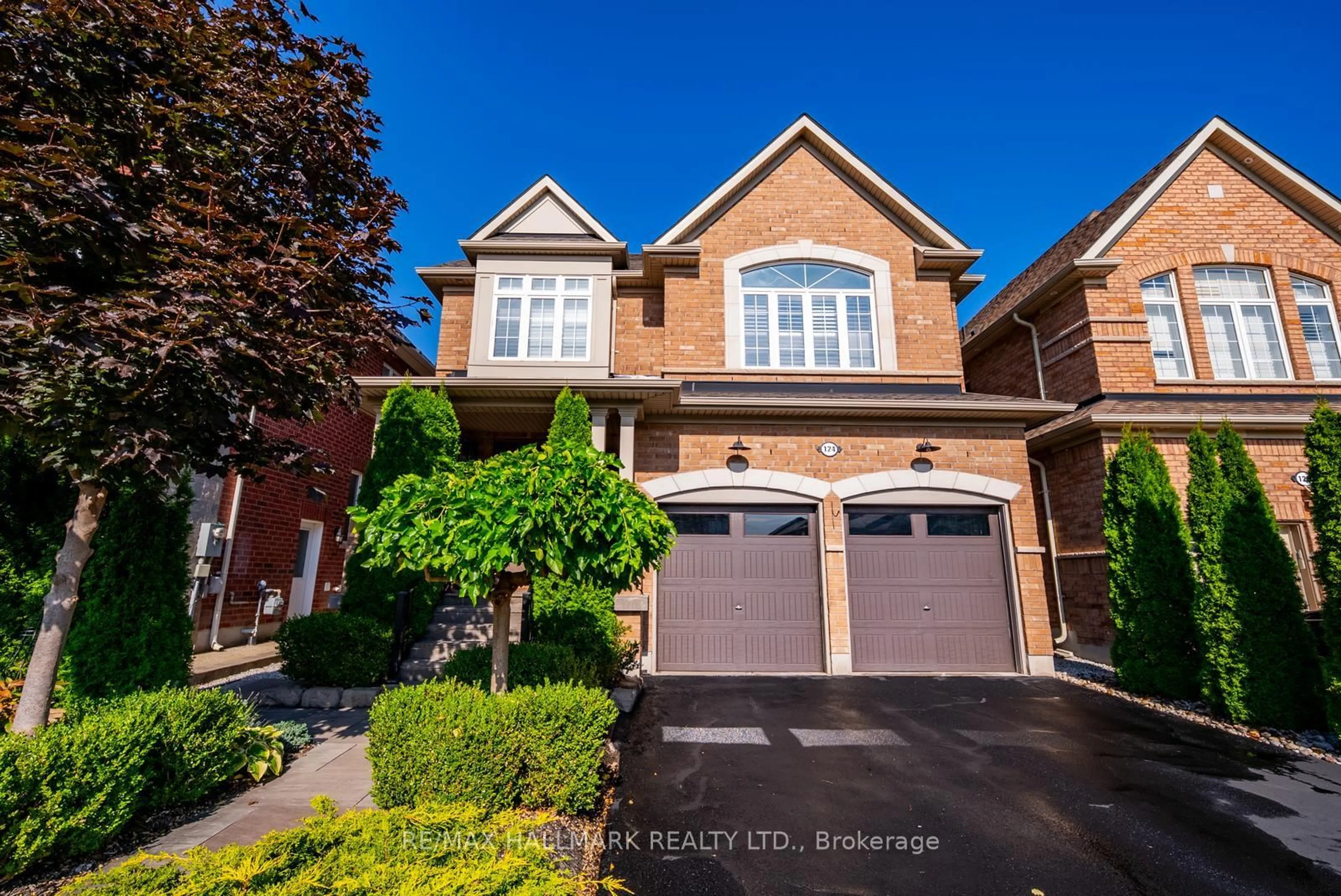 Home with brick exterior material, street for 124 Bonnie Braes Dr, Brampton Ontario L6Y 0W7