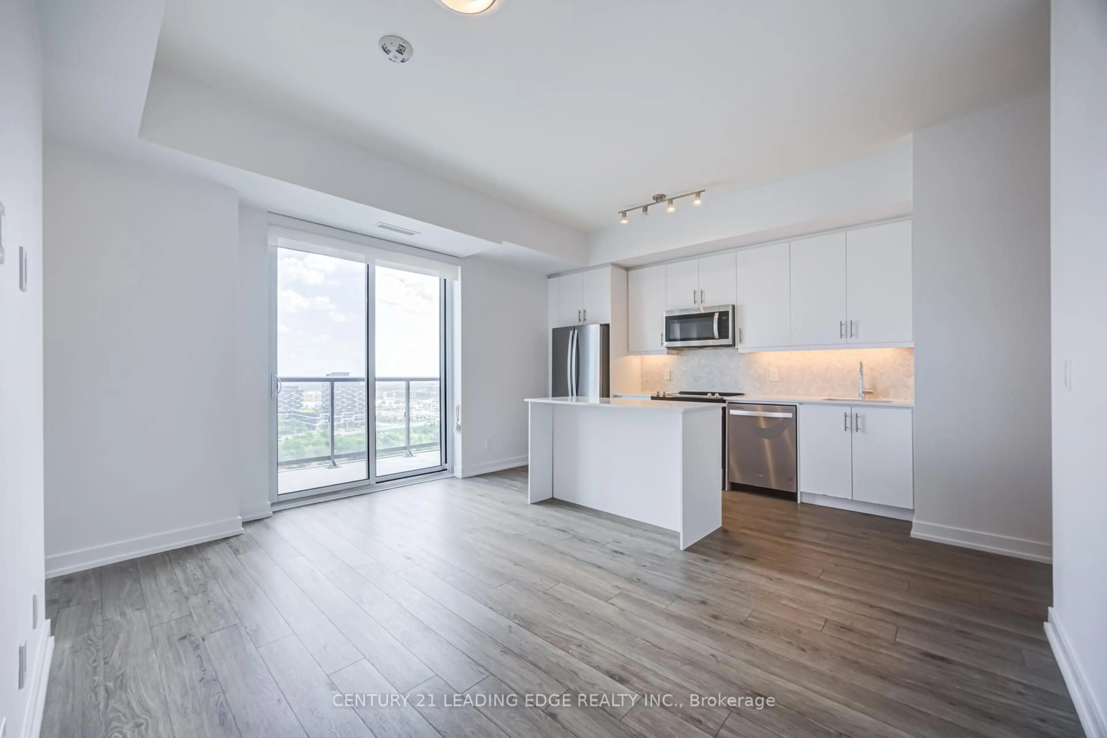 Open concept kitchen, wood/laminate floor for 335 Wheat Boom Dr #2002, Oakville Ontario L6H 7Y1