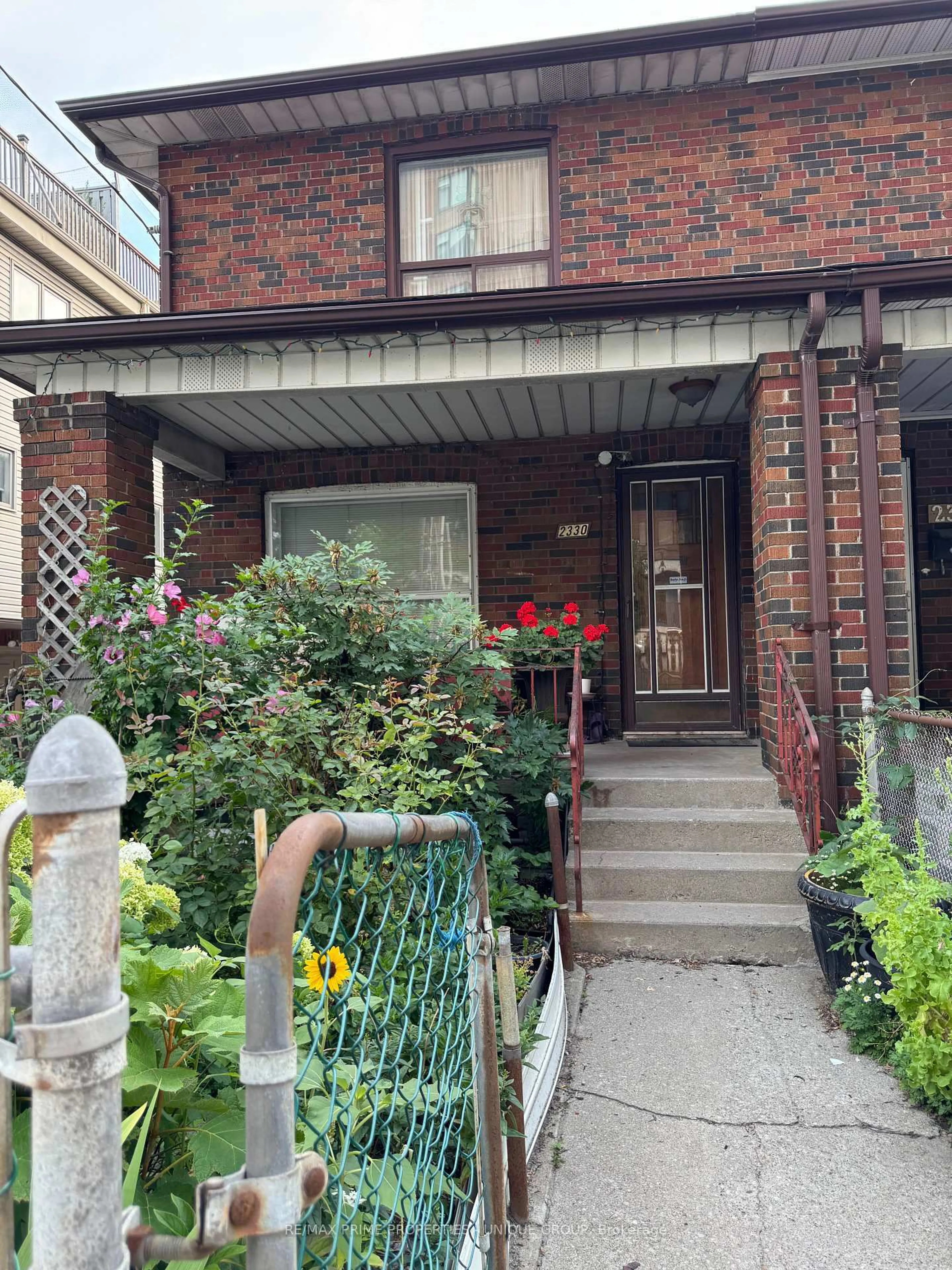 Home with brick exterior material, street for 2330 Dufferin St, Toronto Ontario M6E 3S4