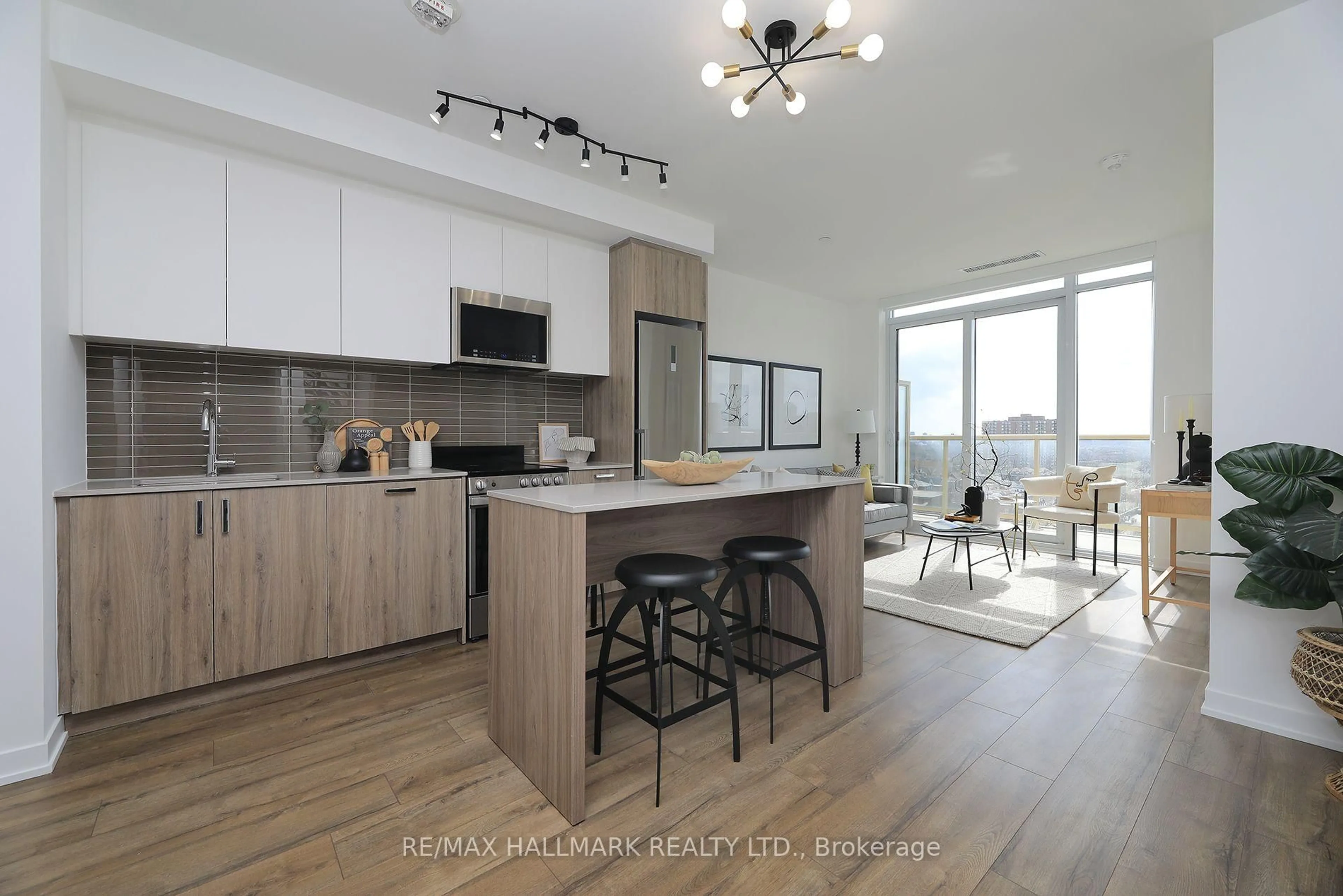 Open concept kitchen, wood/laminate floor for 1787 St. Clair Ave #1111, Toronto Ontario M6N 0B7