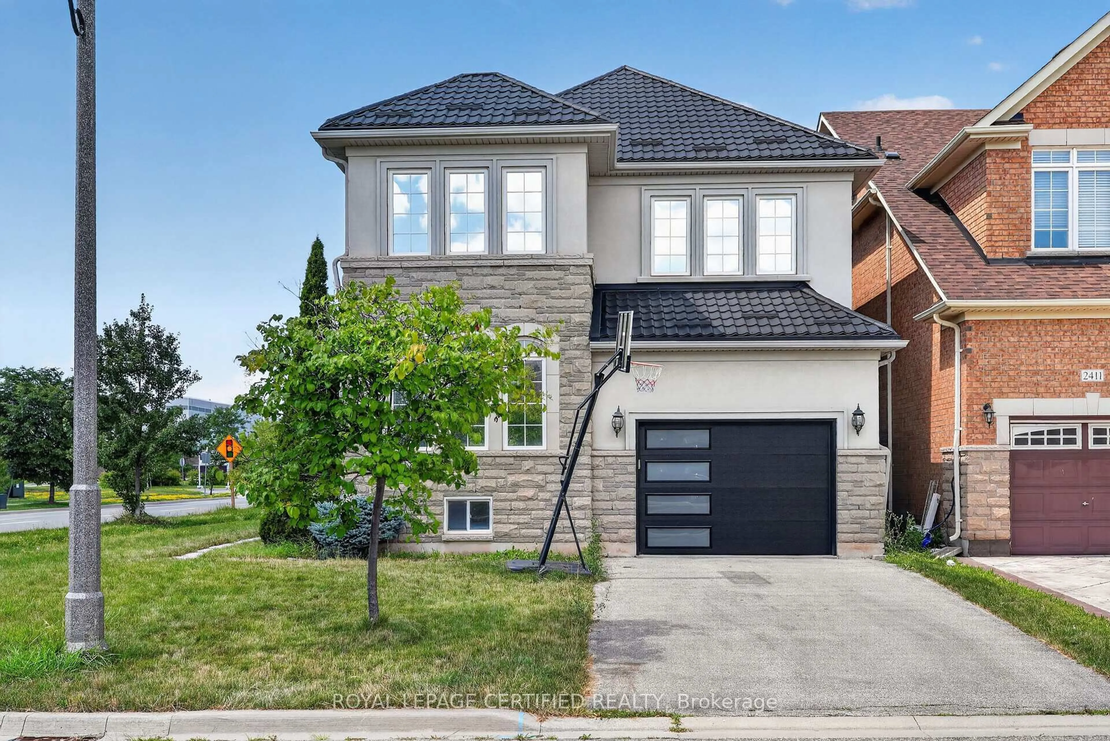 Home with brick exterior material, street for 2561 Grand Oak Tr, Oakville Ontario L6M 0R4