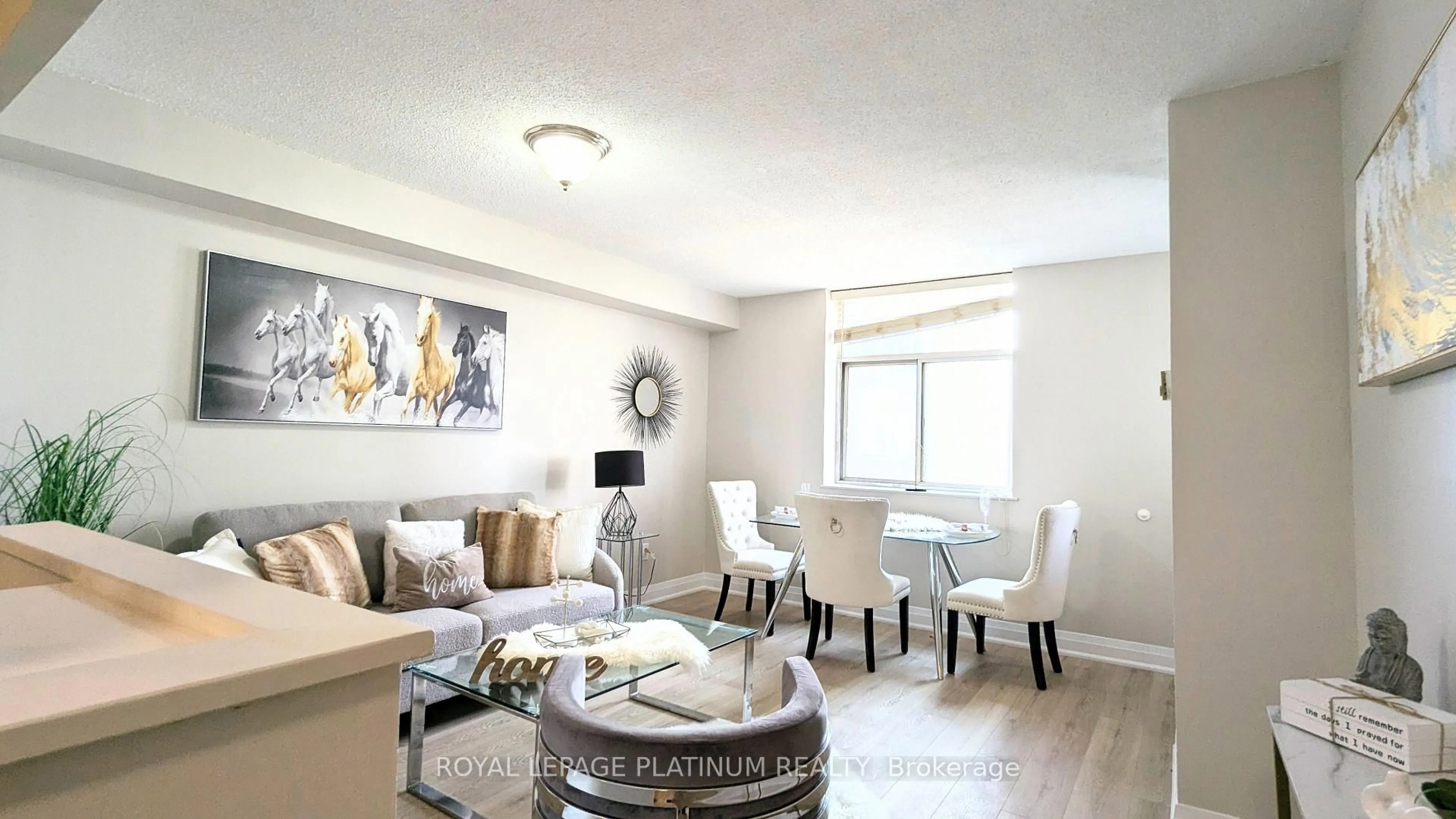 Living room with furniture, wood/laminate floor for 3559 Eglinton Ave #704, Toronto Ontario M6M 5C6