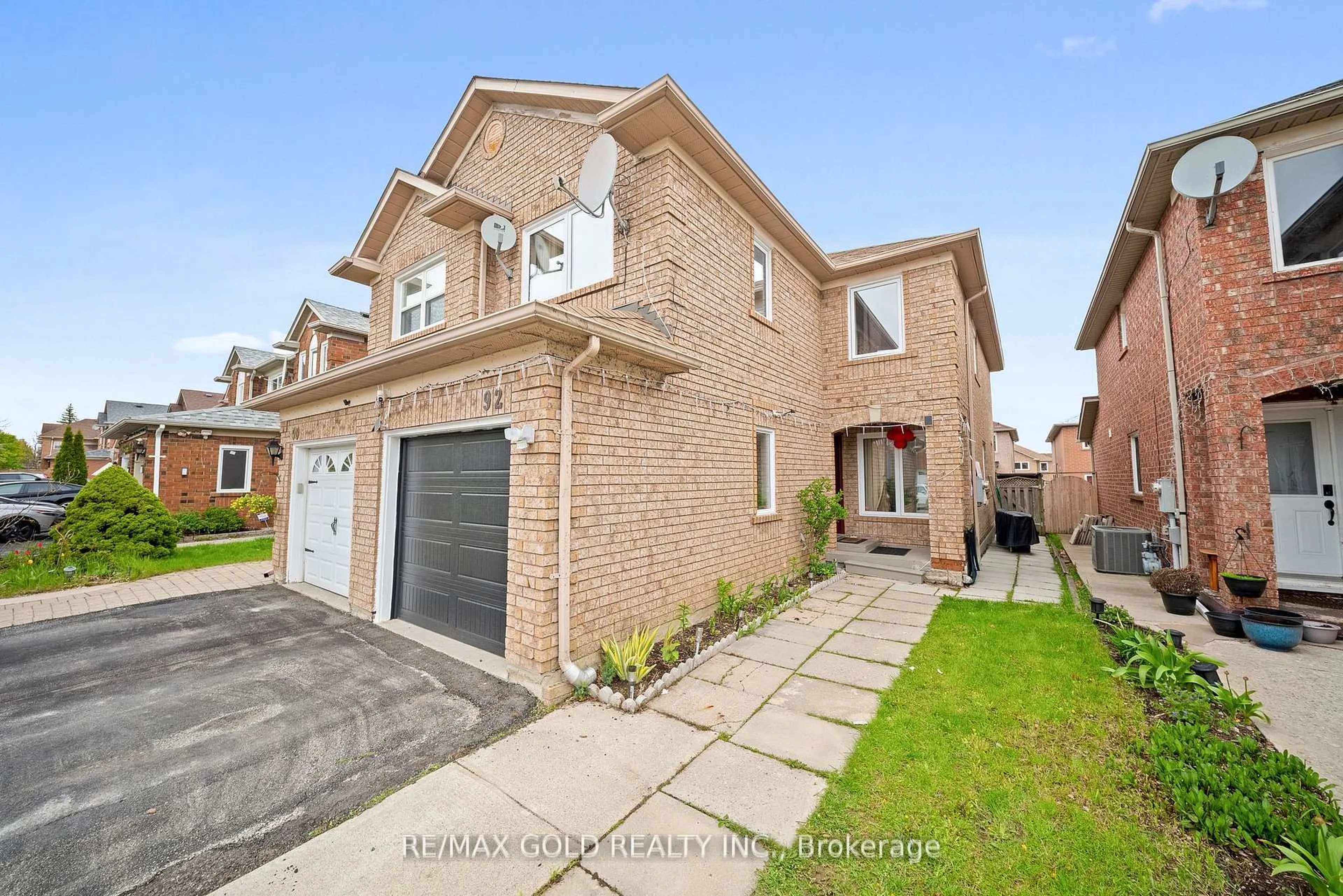 Home with brick exterior material, street for 92 Dandelion Rd, Brampton Ontario L6R 1Y1