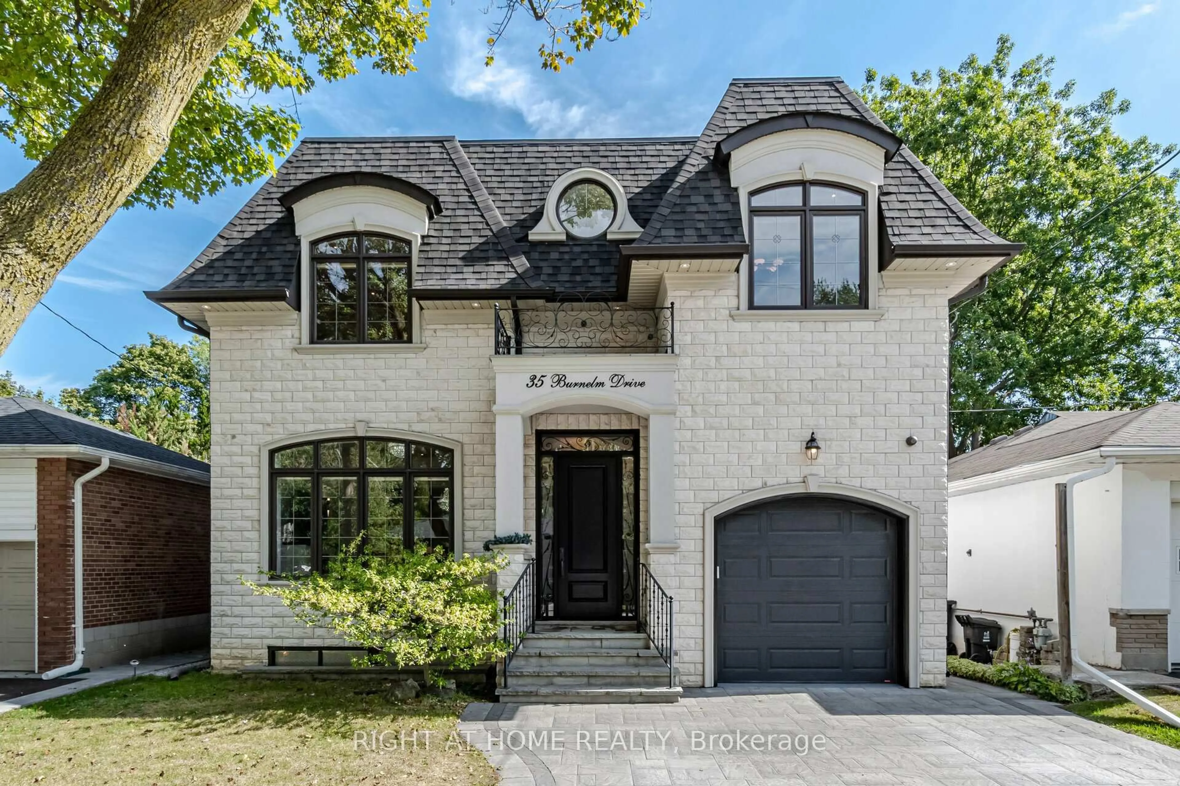 Home with brick exterior material, street for 35 Burnelm Dr, Toronto Ontario M9B 4N2