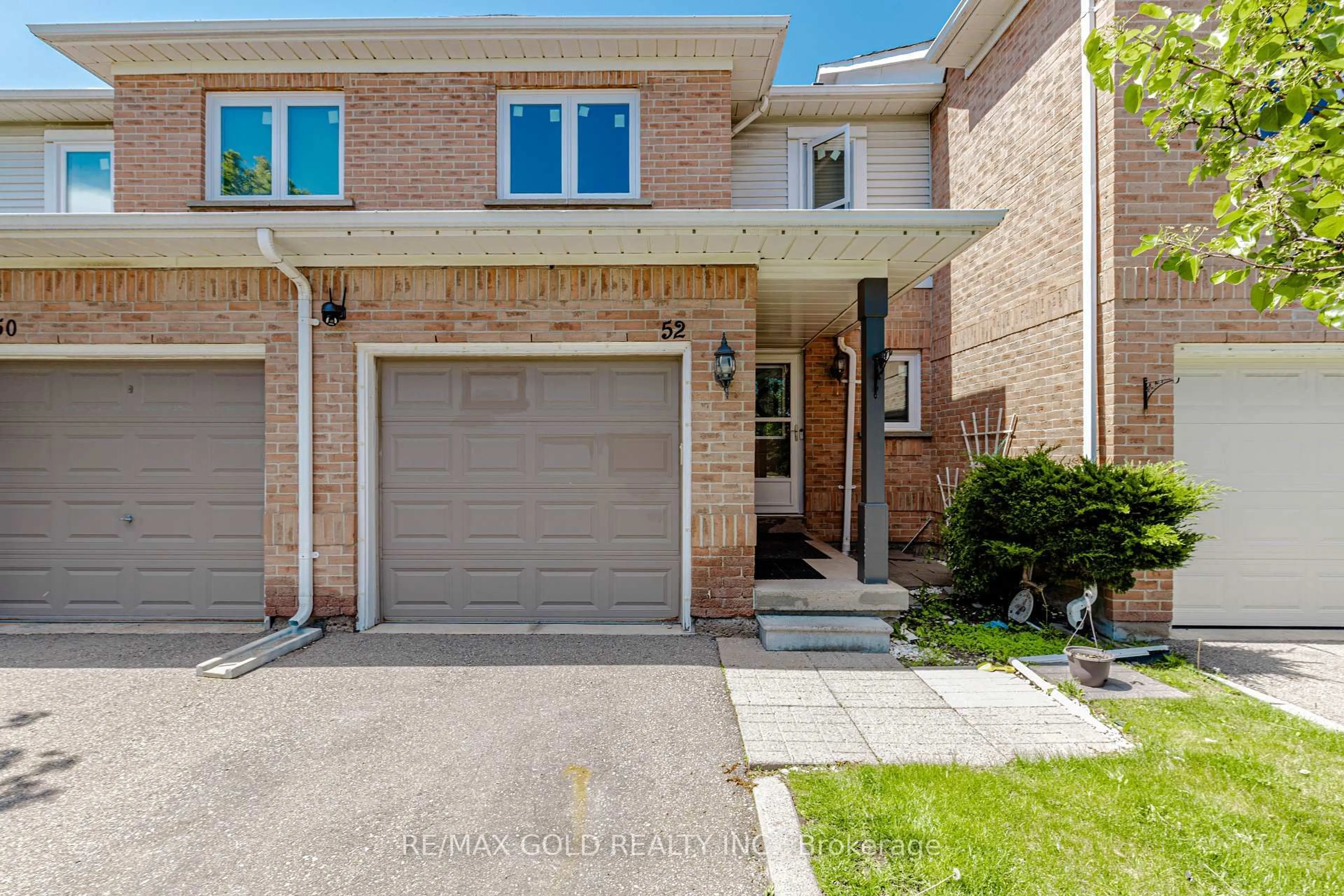 Home with brick exterior material, street for 52 Wickstead Crt, Brampton Ontario L6R 1N8