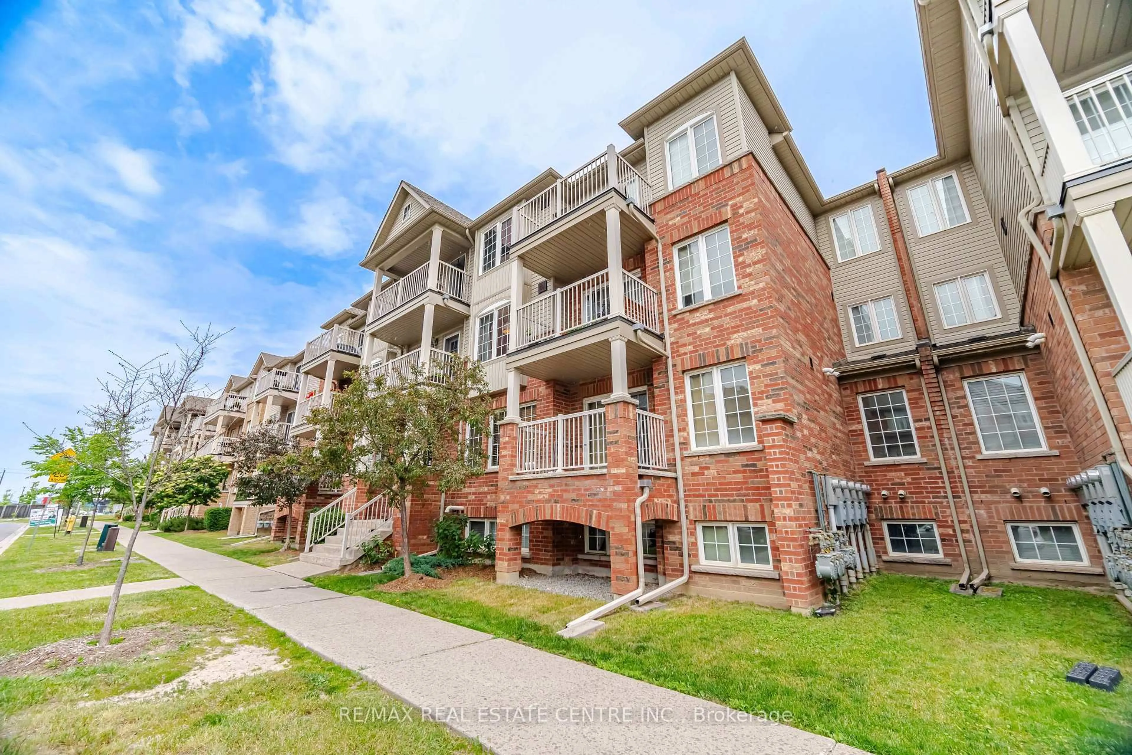 A pic from outside/outdoor area/front of a property/back of a property/a pic from drone, unknown for 153 Isaac Devins Blvd #2, Toronto Ontario M9M 0C5