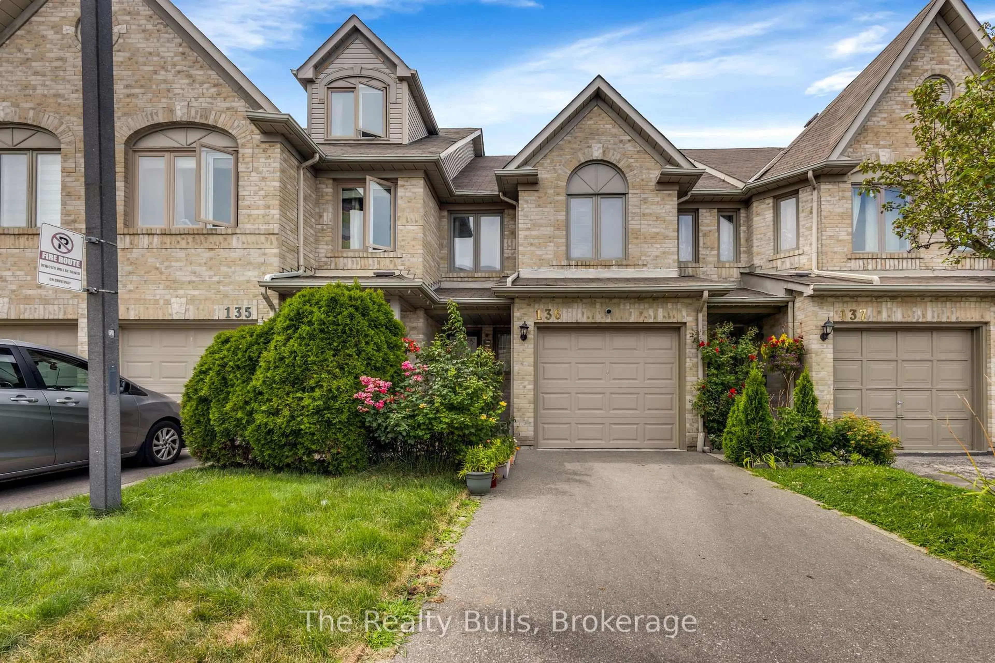 Home with brick exterior material, street for 1292 Sherwood Mills Blvd #136, Mississauga Ontario L5V 2G8