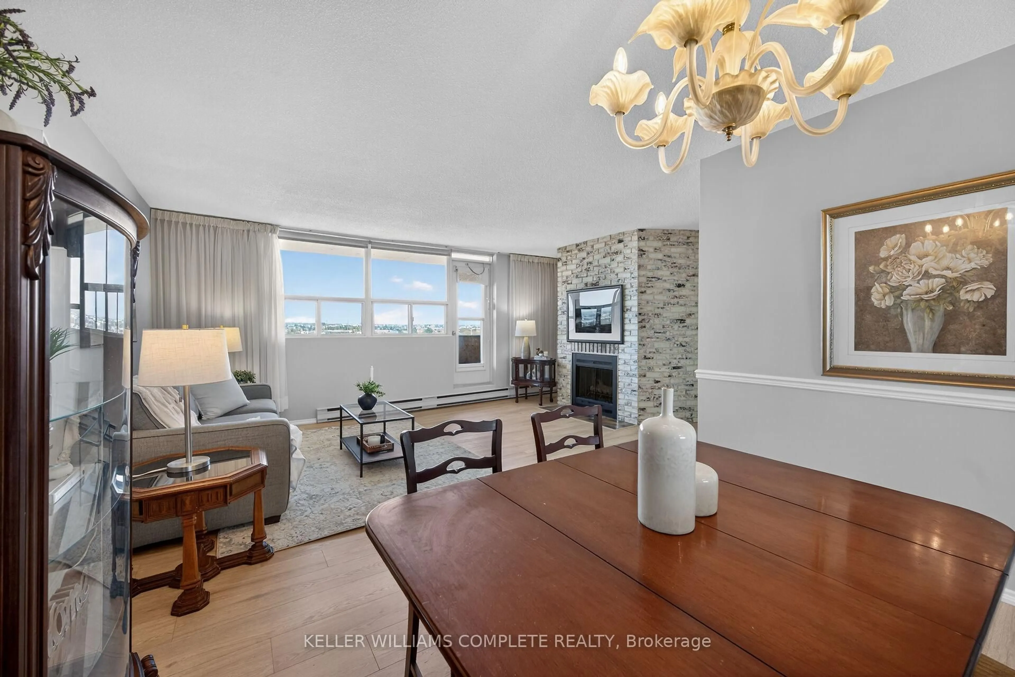 Living room with furniture, unknown for 700 Dynes Rd #904, Burlington Ontario L7N 3M2