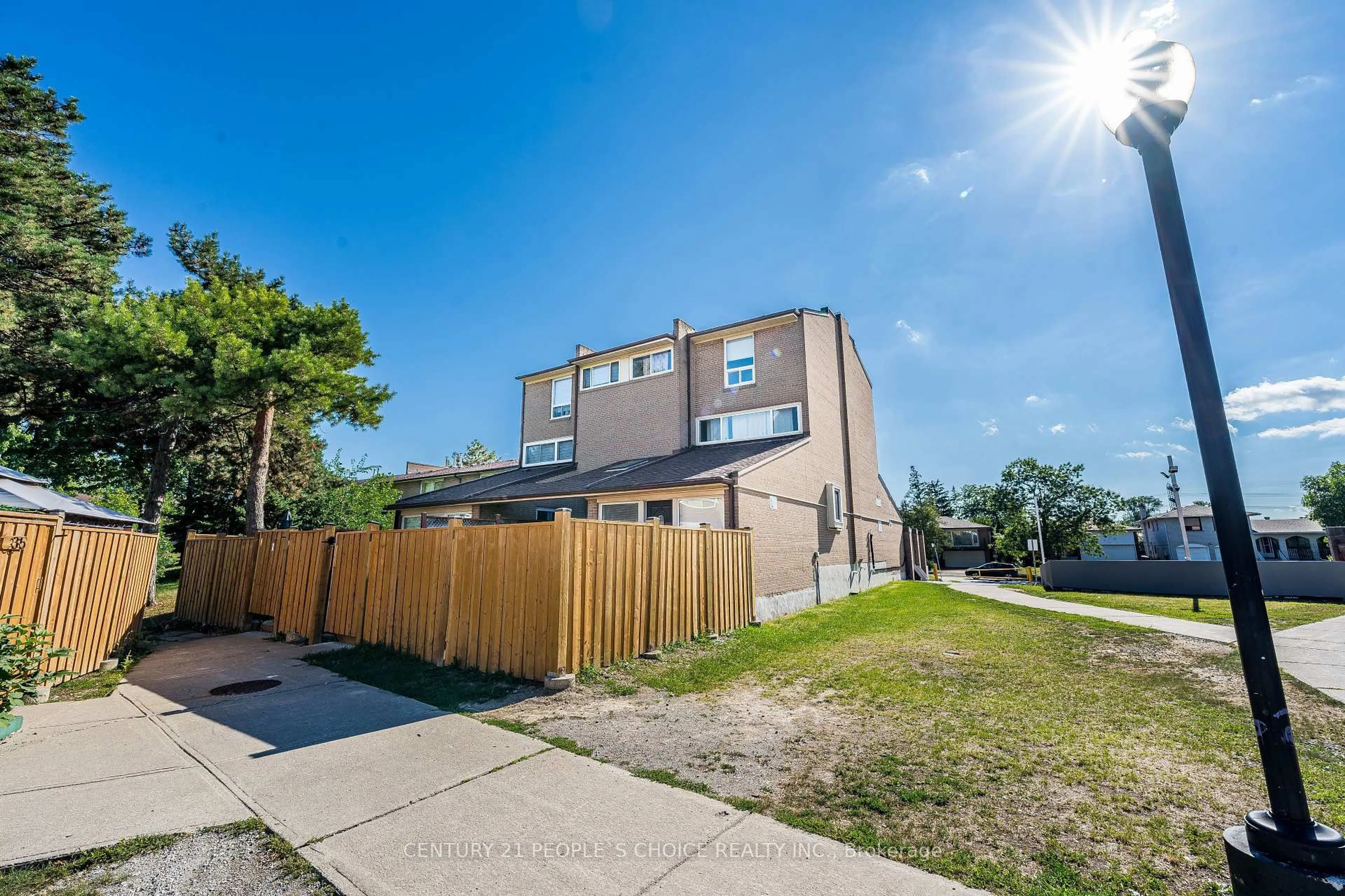 A pic from outside/outdoor area/front of a property/back of a property/a pic from drone, street for 242 John Garland Blvd #2, Toronto Ontario M9V 1N8