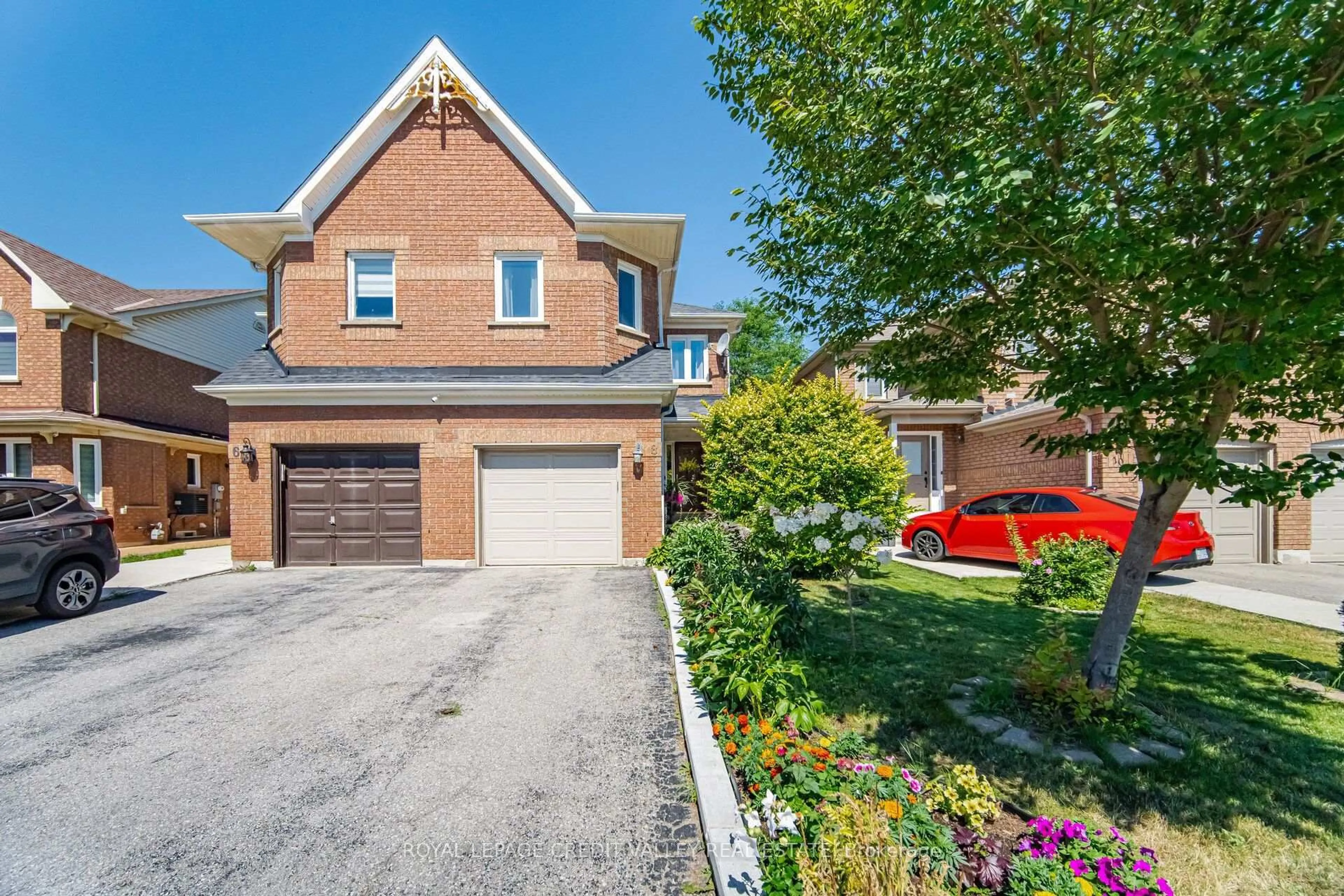 Home with brick exterior material, street for 8 Pressed Brick Dr, Brampton Ontario L6V 4K8