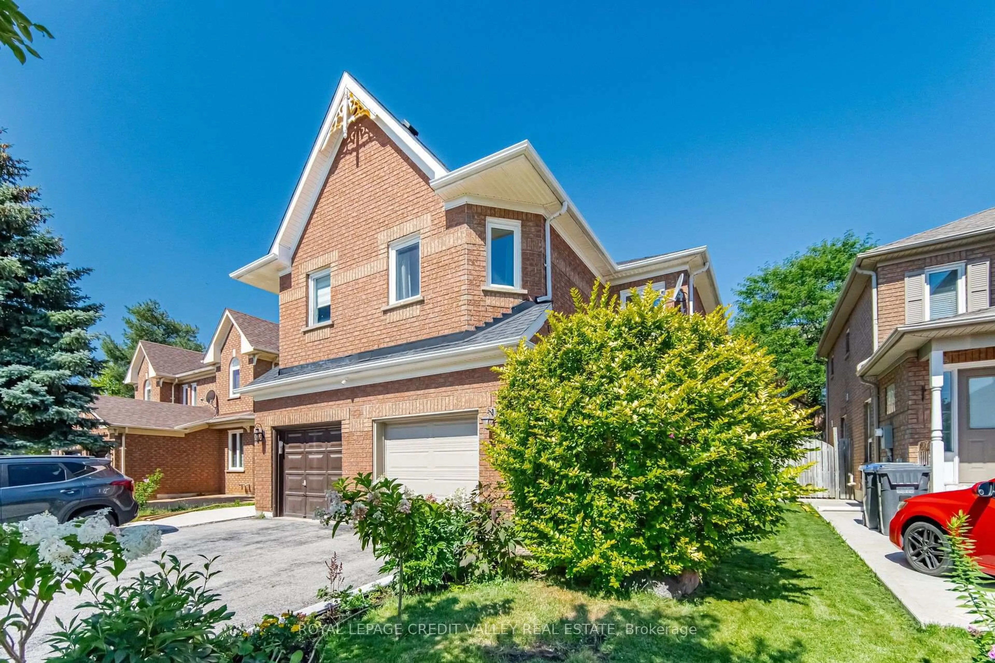 Home with brick exterior material, street for 8 Pressed Brick Dr, Brampton Ontario L6V 4K8