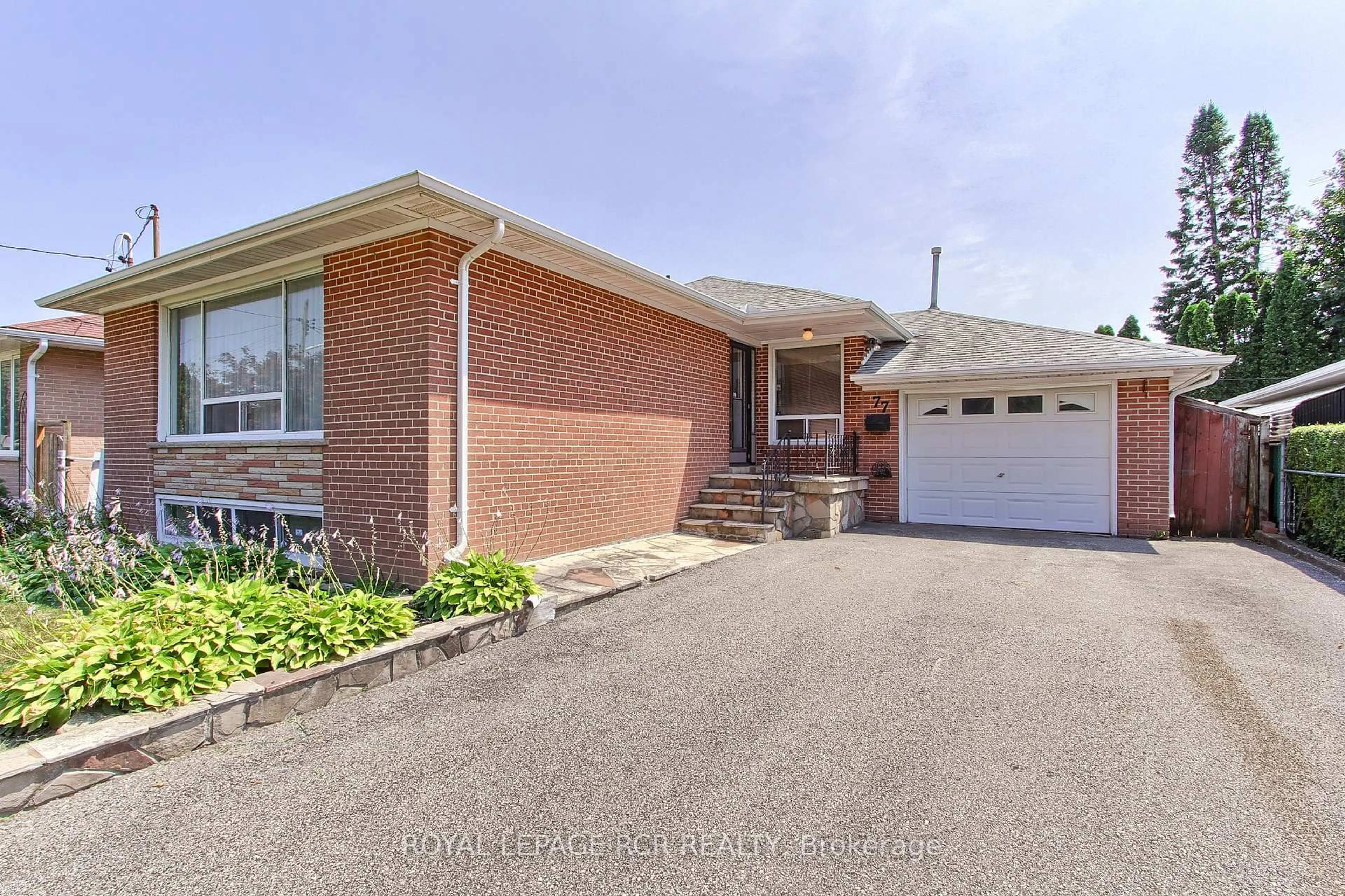 Home with brick exterior material, street for 77 Alhart Dr, Toronto Ontario M9V 2N1