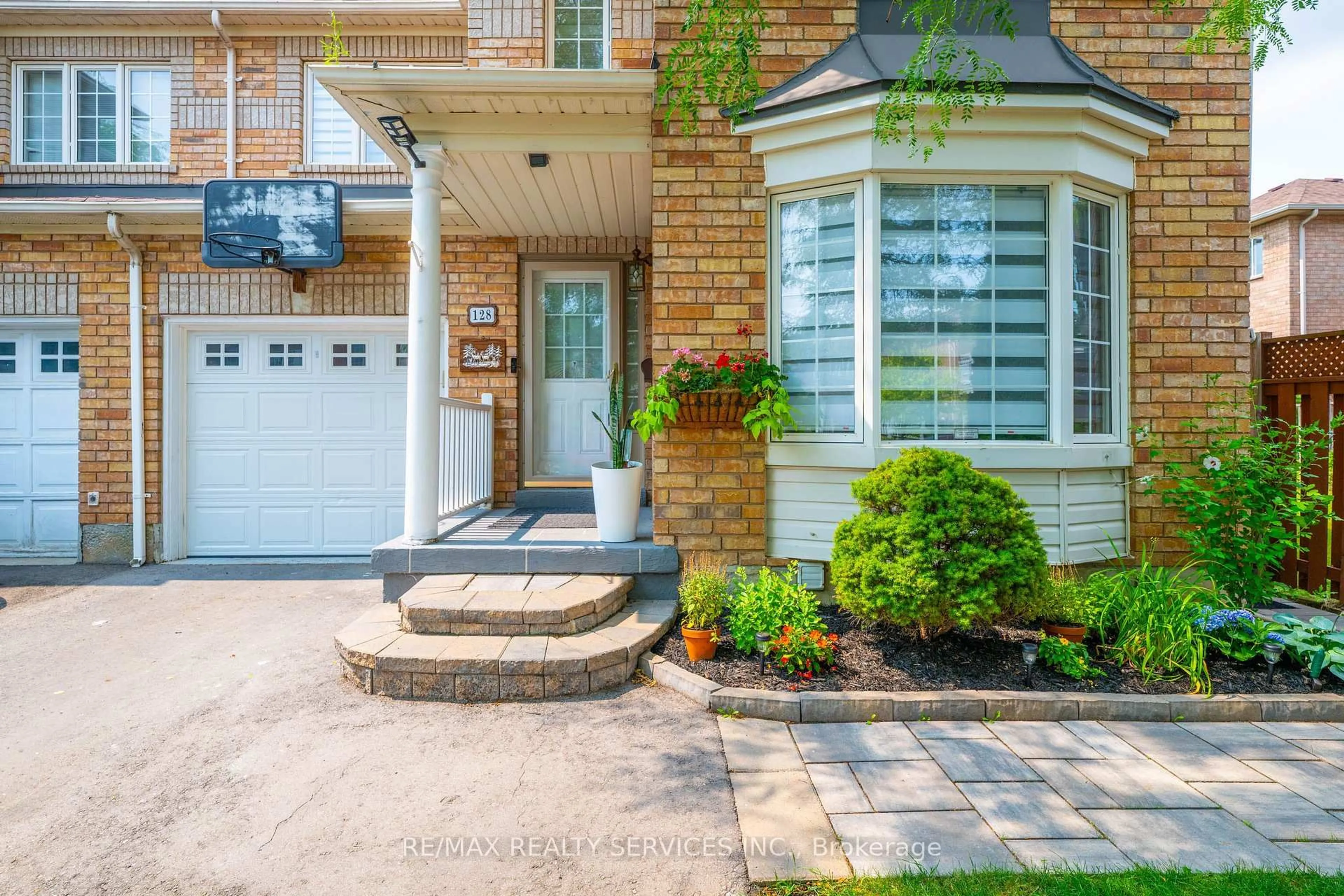 Home with brick exterior material, street for 128 Seaside Circ, Brampton Ontario L6R 2G9