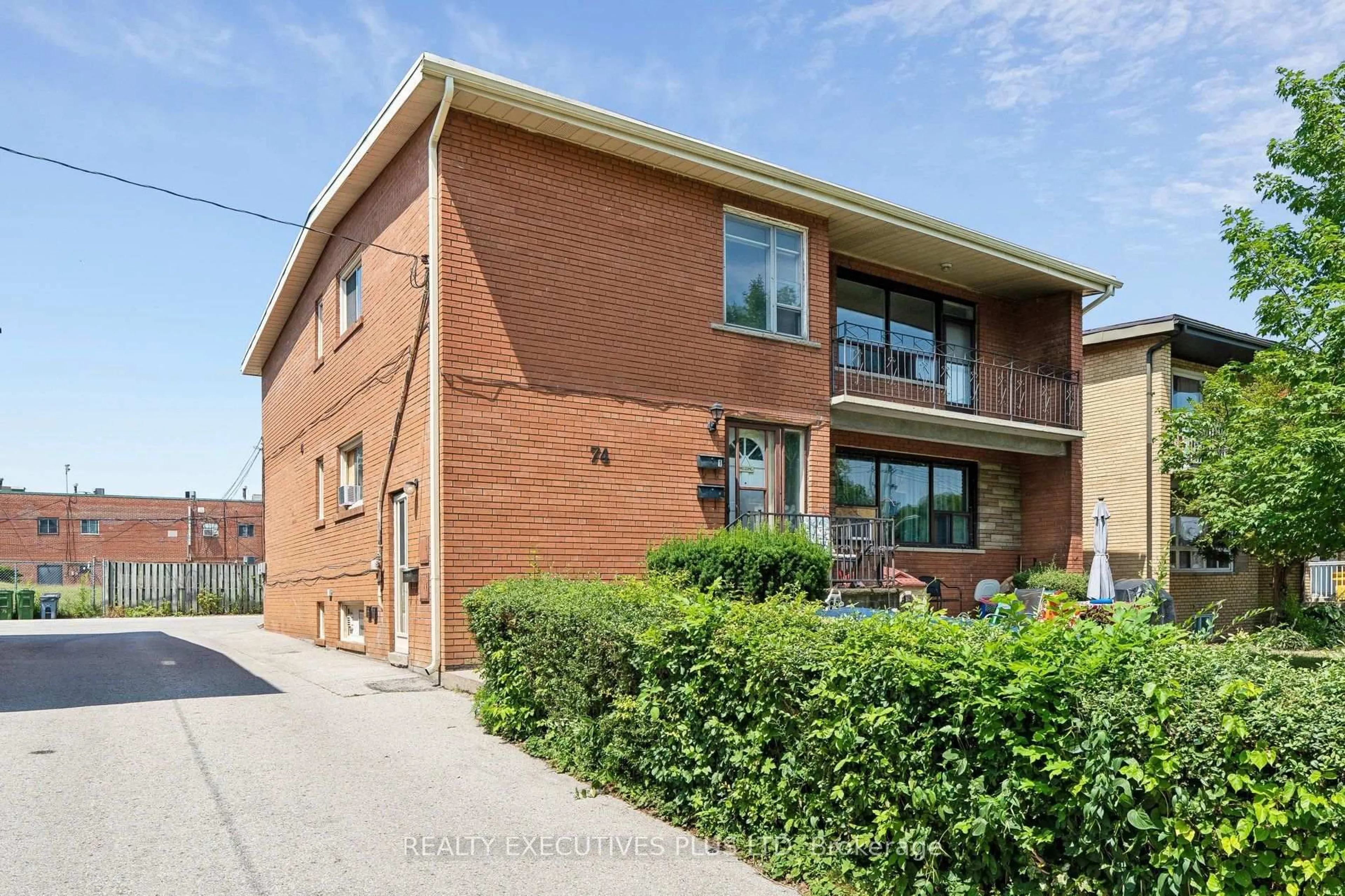 Home with brick exterior material, street for 74 Calstock Dr, Toronto Ontario M9V 1H2