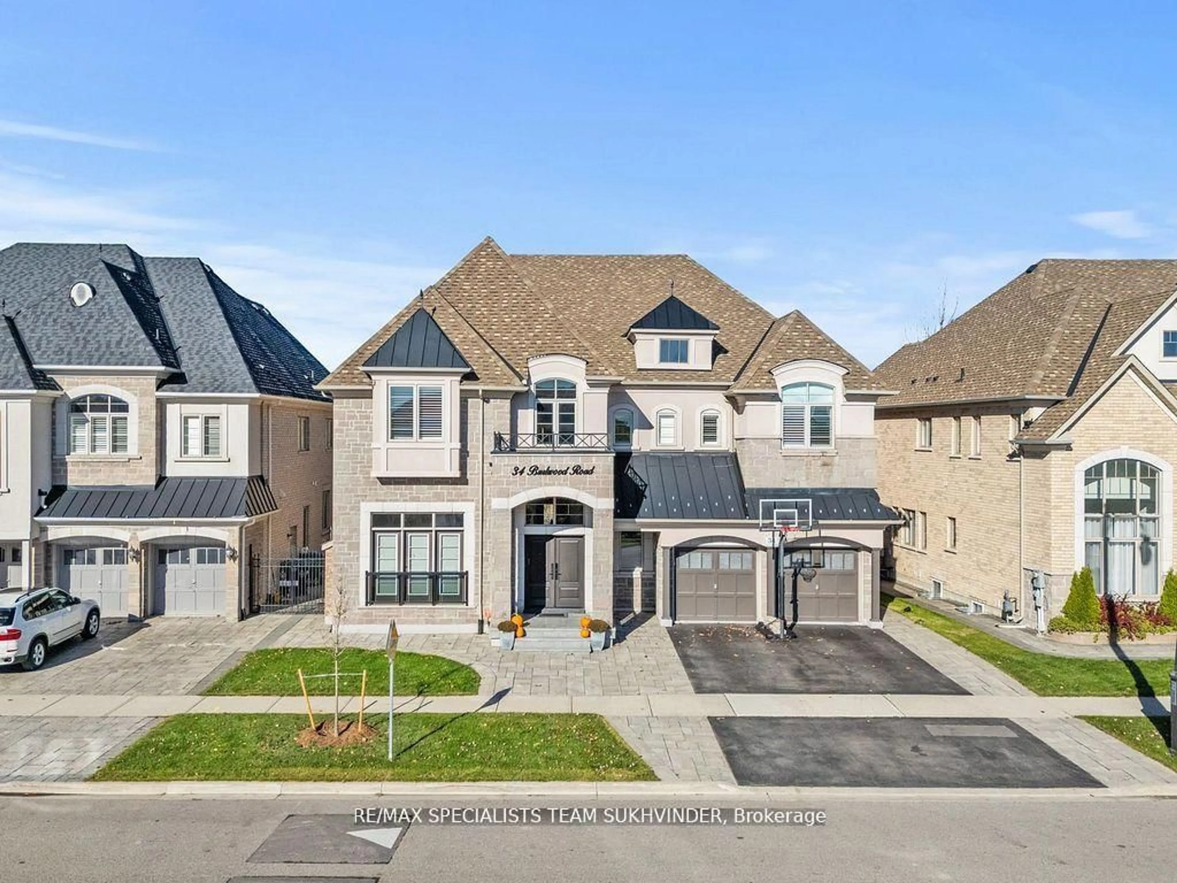 Home with brick exterior material, street for 34 Burlwood Rd, Brampton Ontario L6P 4E8