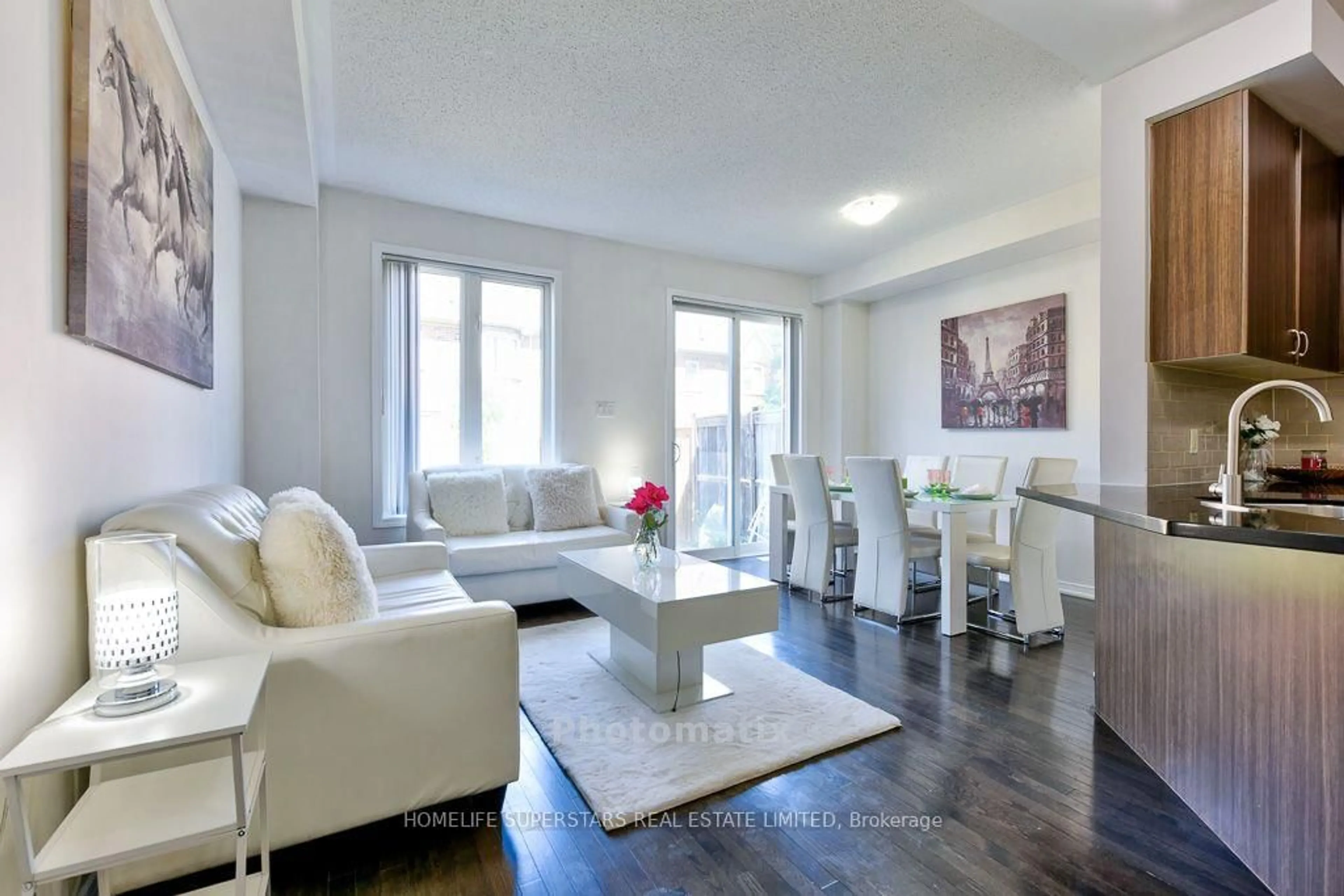 Living room with furniture, wood/laminate floor for 61 Utopia Way, Brampton Ontario L6P 4A4