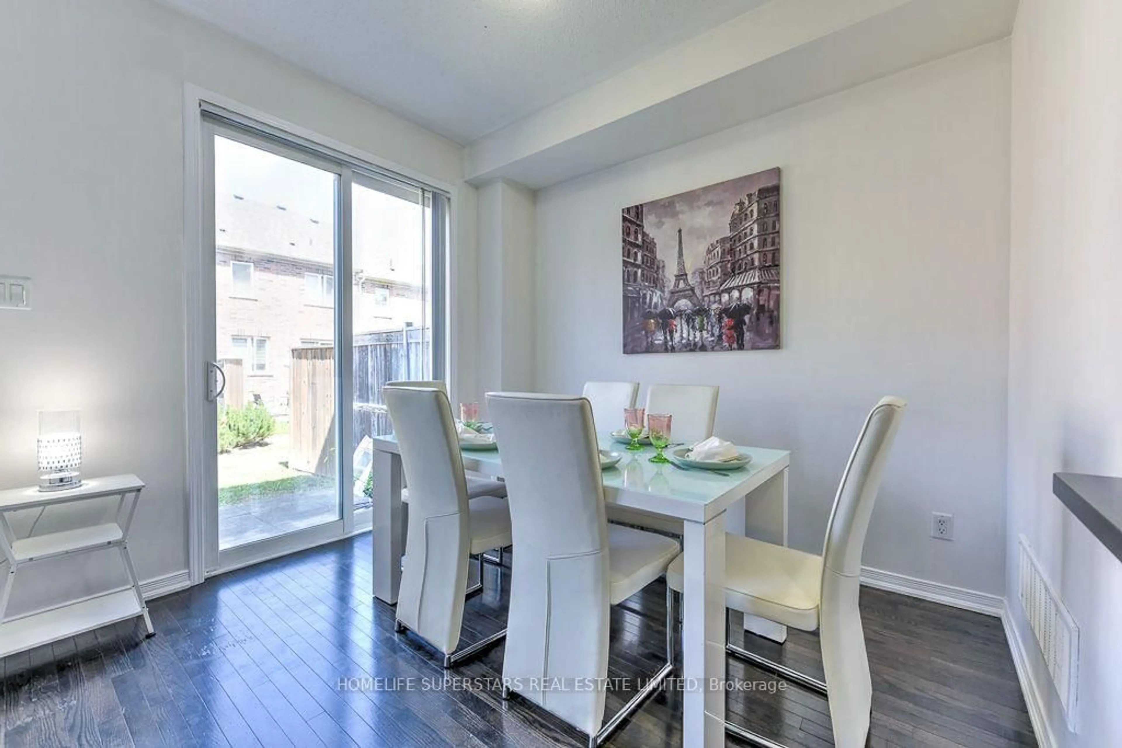 Dining room, wood/laminate floor for 61 Utopia Way, Brampton Ontario L6P 4A4