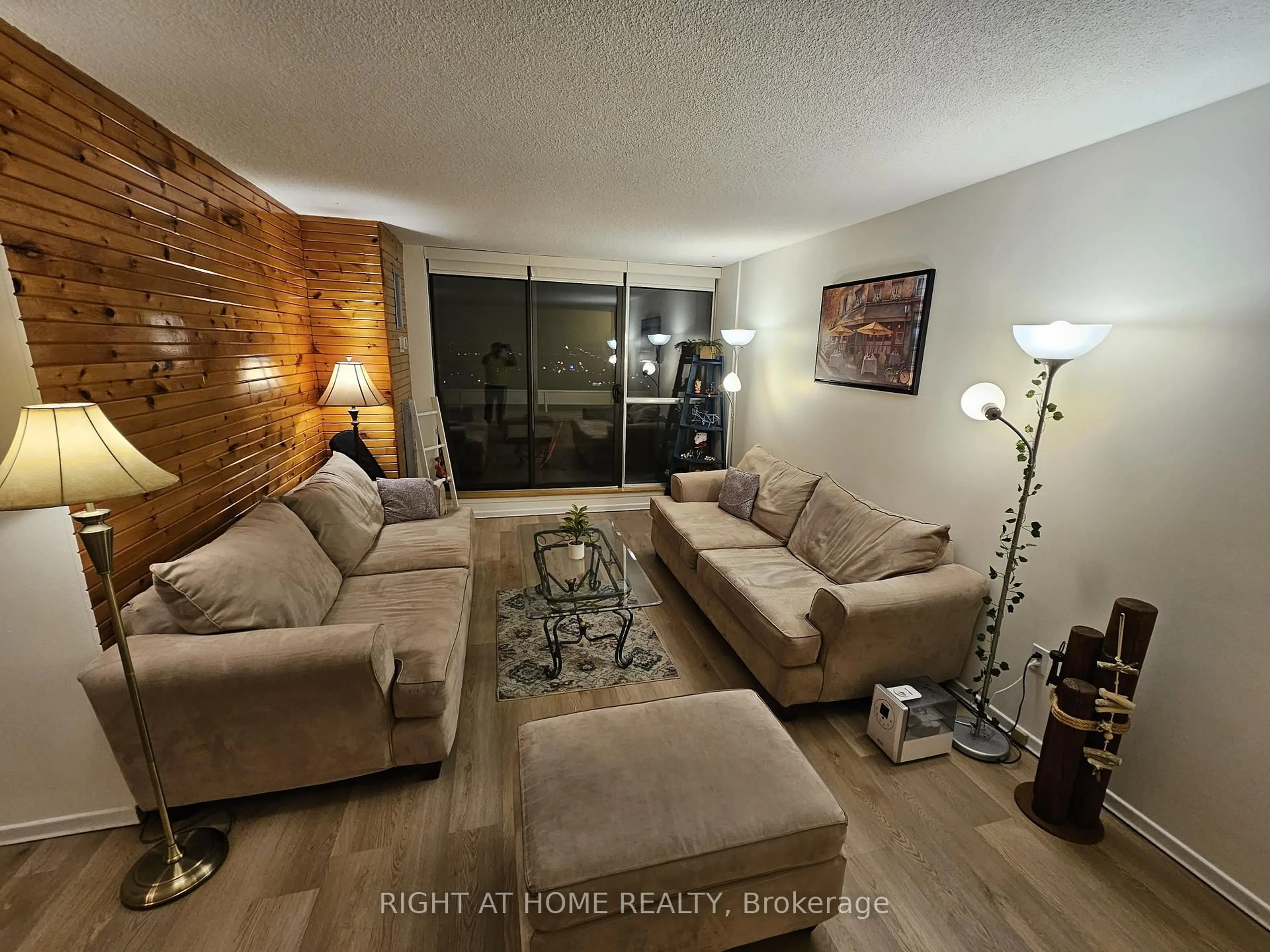 Living room with furniture, unknown for 25 Kensington Rd #1912, Brampton Ontario L6T 3W8