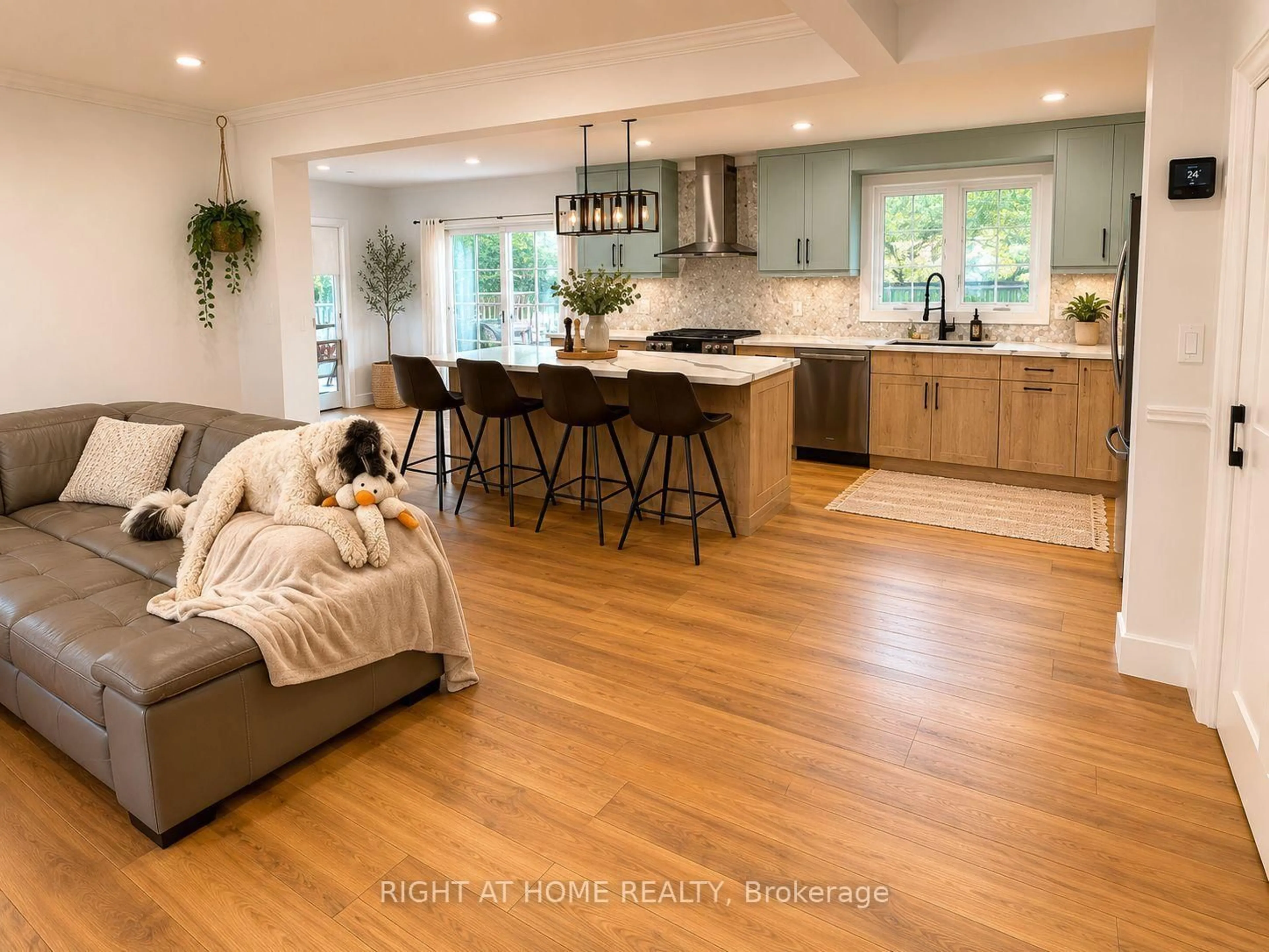 Open concept kitchen, wood/laminate floor for 4440 Cosburn Cres, Burlington Ontario L7L 1S5