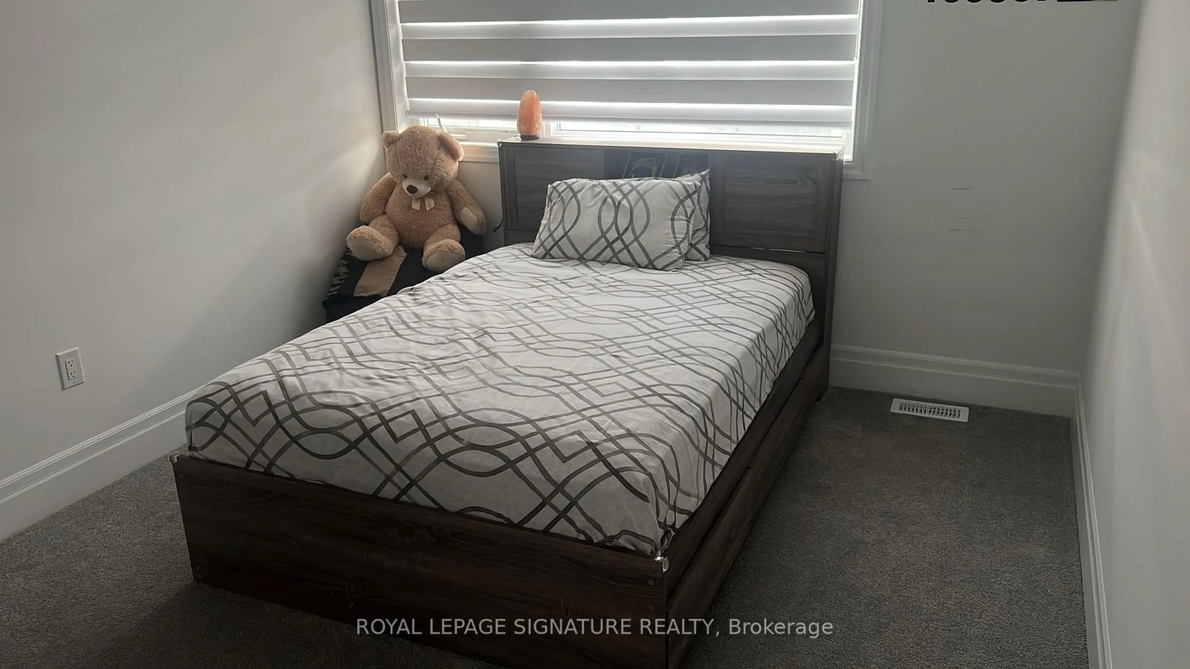 Bedroom with bed, wood/laminate floor for 1894 Thames Circ, Milton Ontario L9E 1Y9