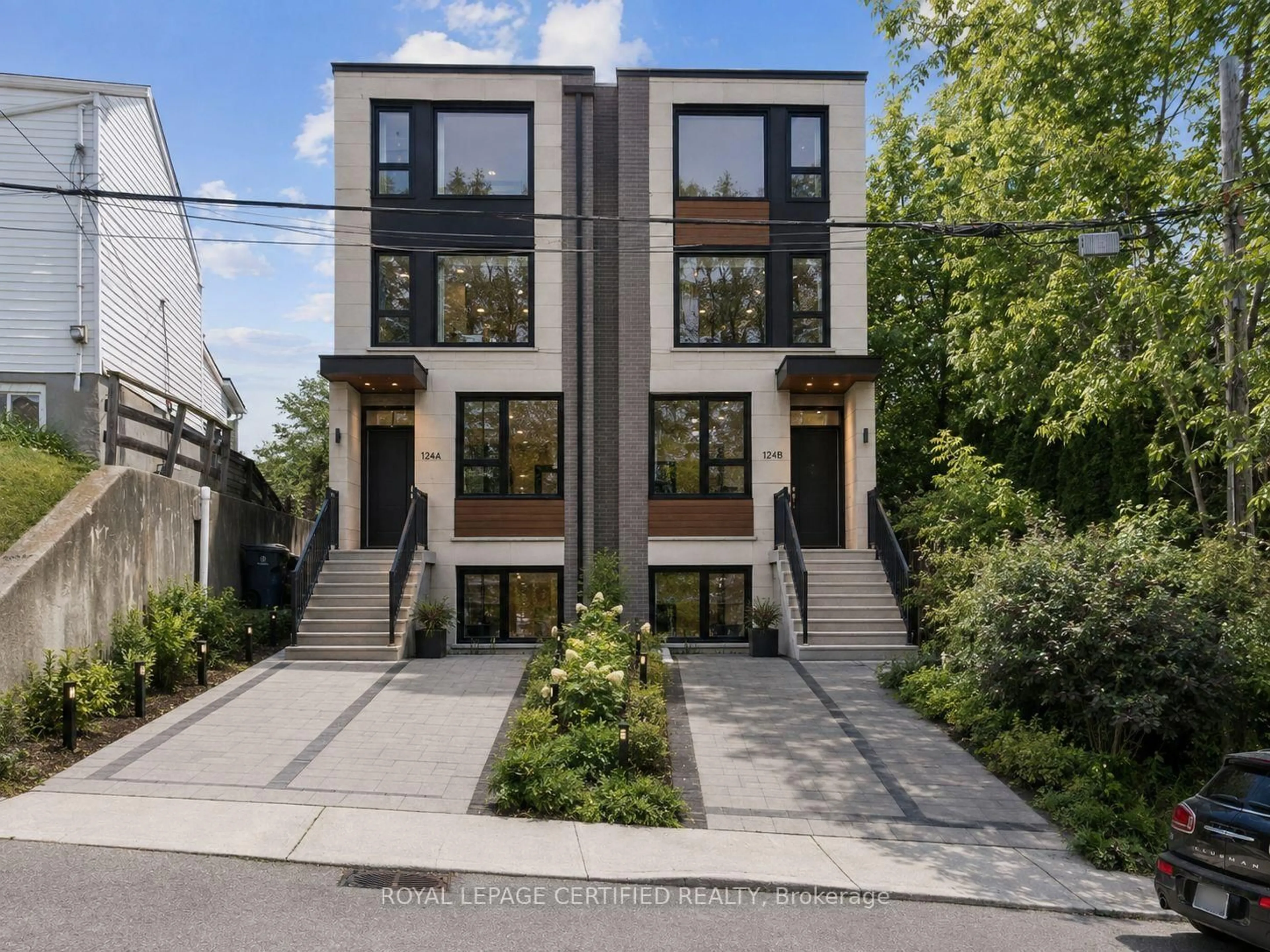 Home with brick exterior material, street for 33 Donald Ave, Toronto Ontario M6M 1J9