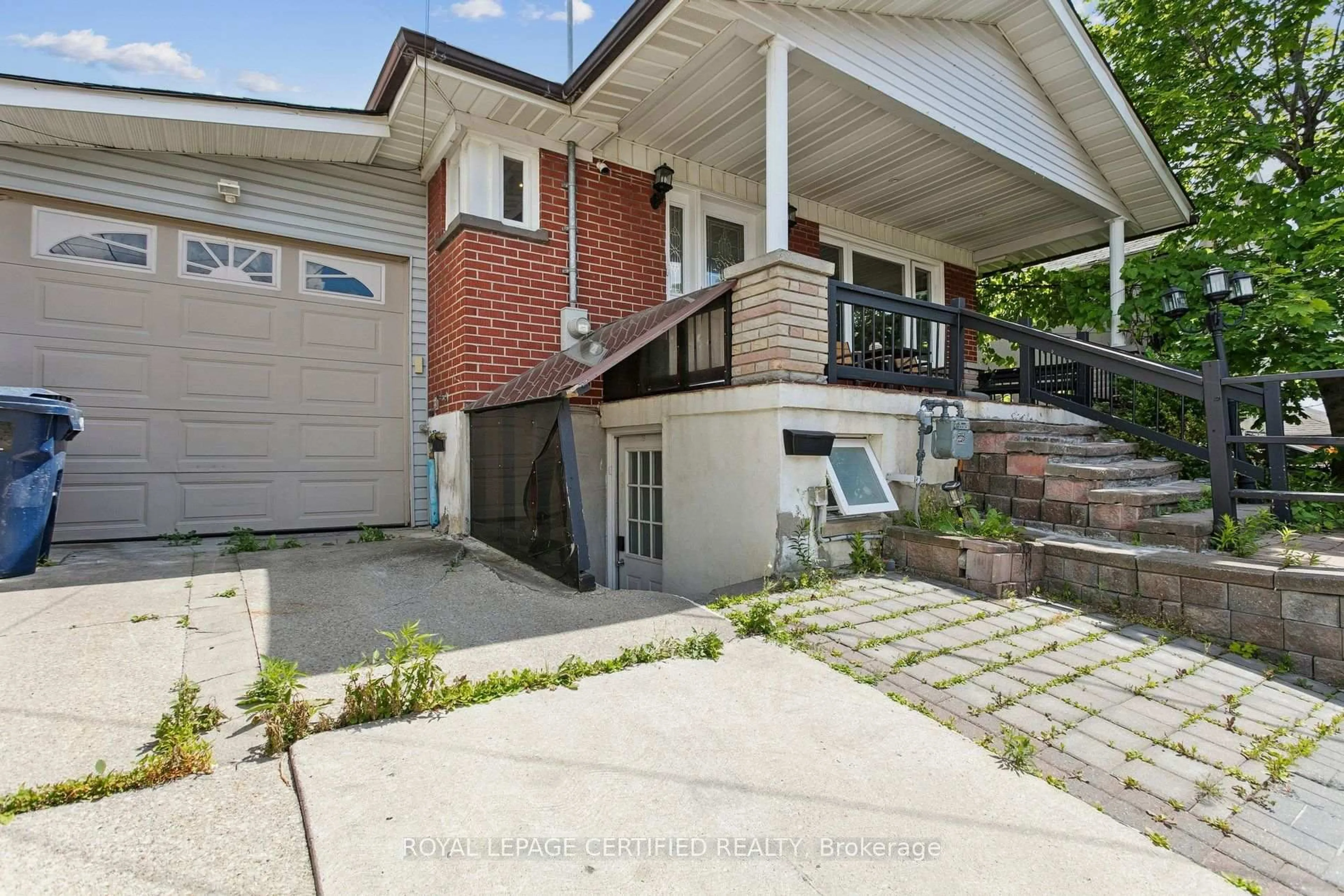 Home with brick exterior material, street for 33 Donald Ave, Toronto Ontario M6M 1J9