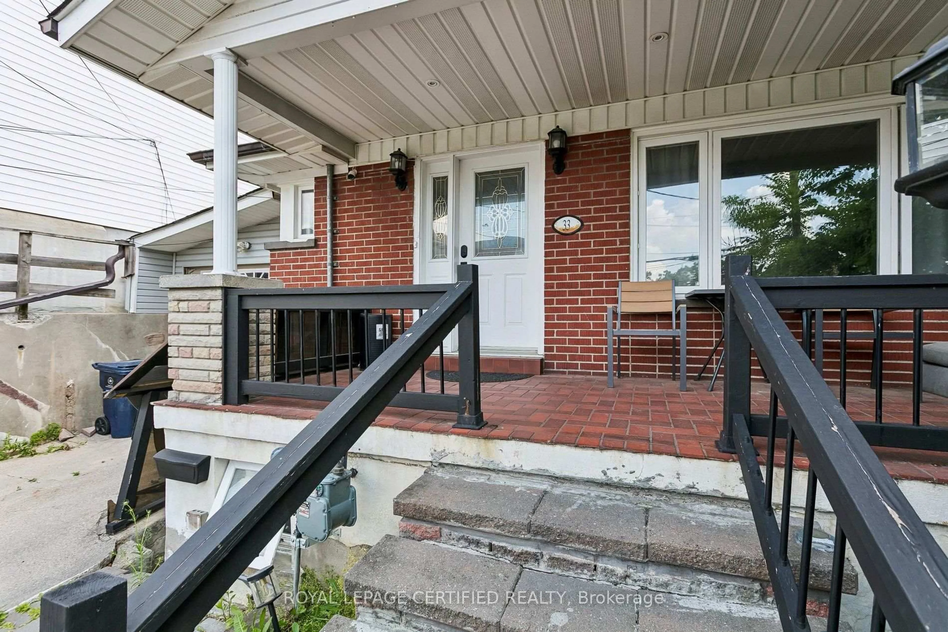 Home with brick exterior material, street for 33 Donald Ave, Toronto Ontario M6M 1J9