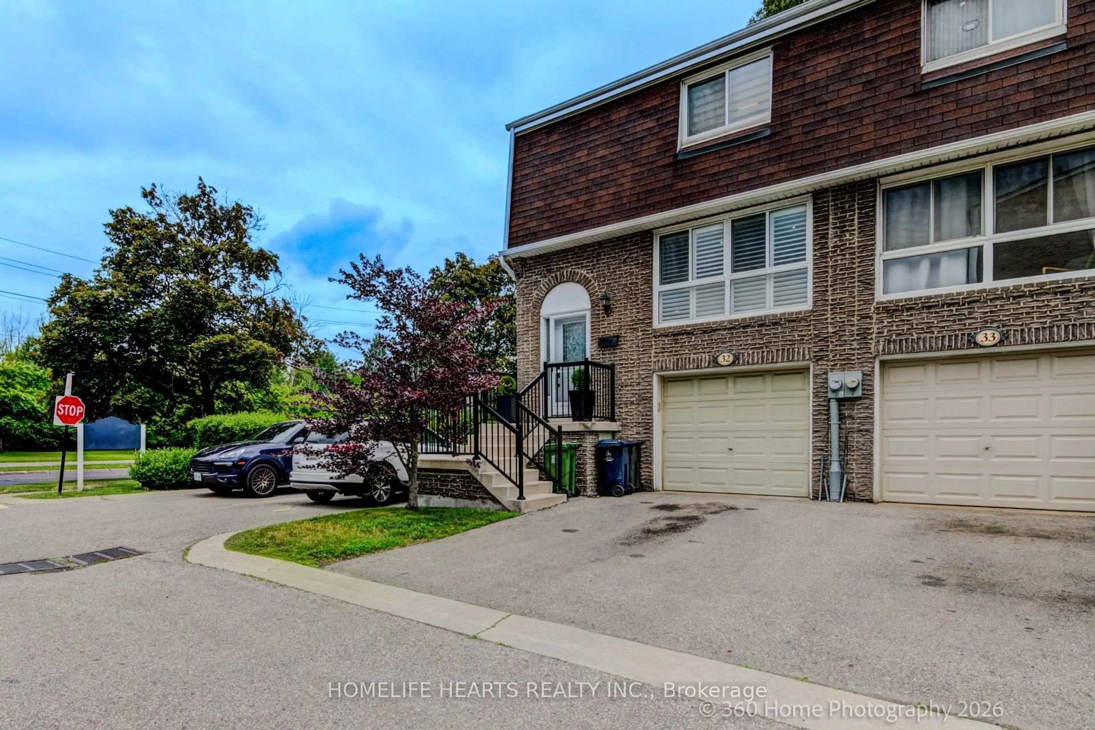 A pic from outside/outdoor area/front of a property/back of a property/a pic from drone, street for 625 Rathburn Rd #32, Toronto Ontario M9C 3T5