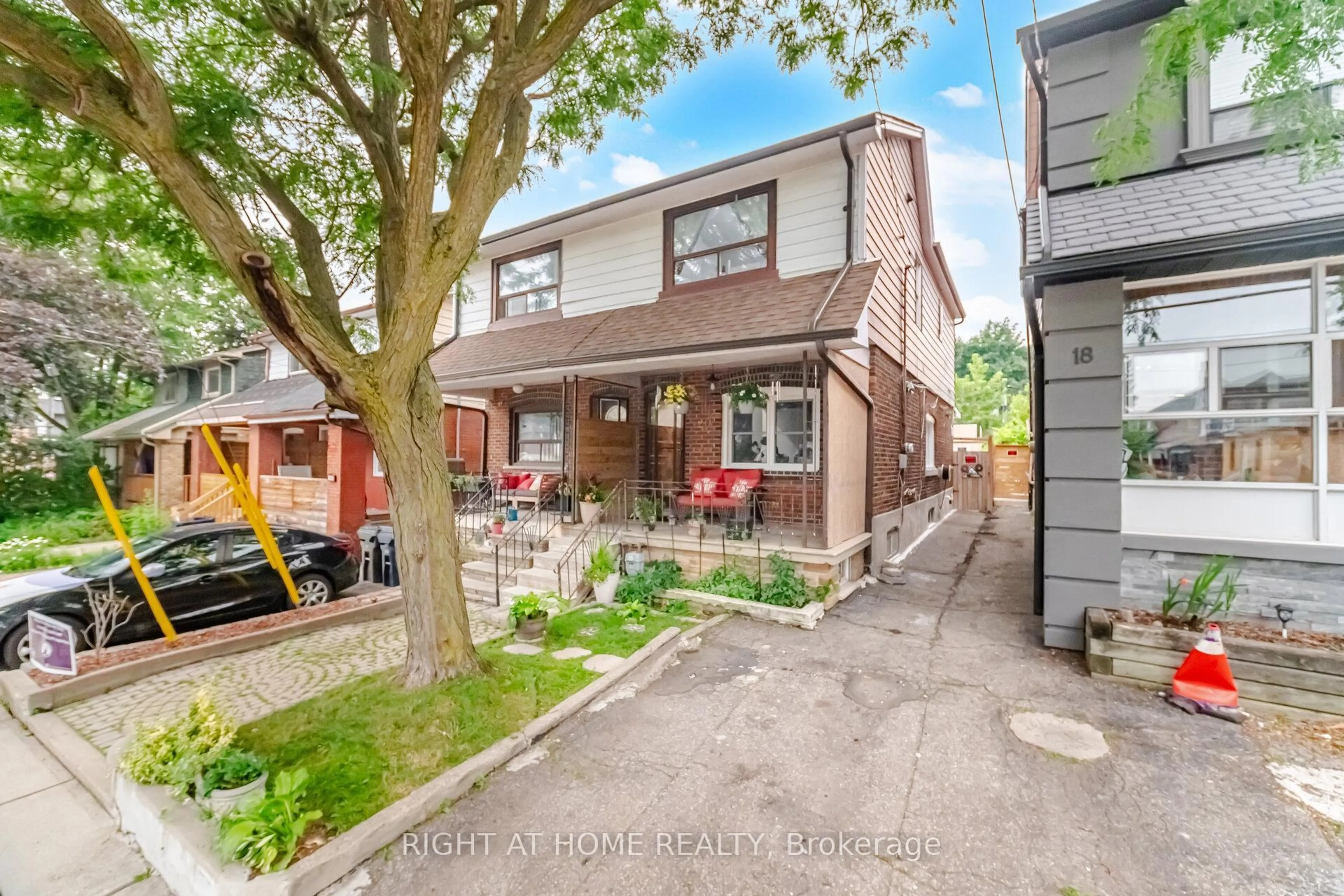 Home with brick exterior material, street for 20 Rockwell Ave, Toronto Ontario M6N 1N5
